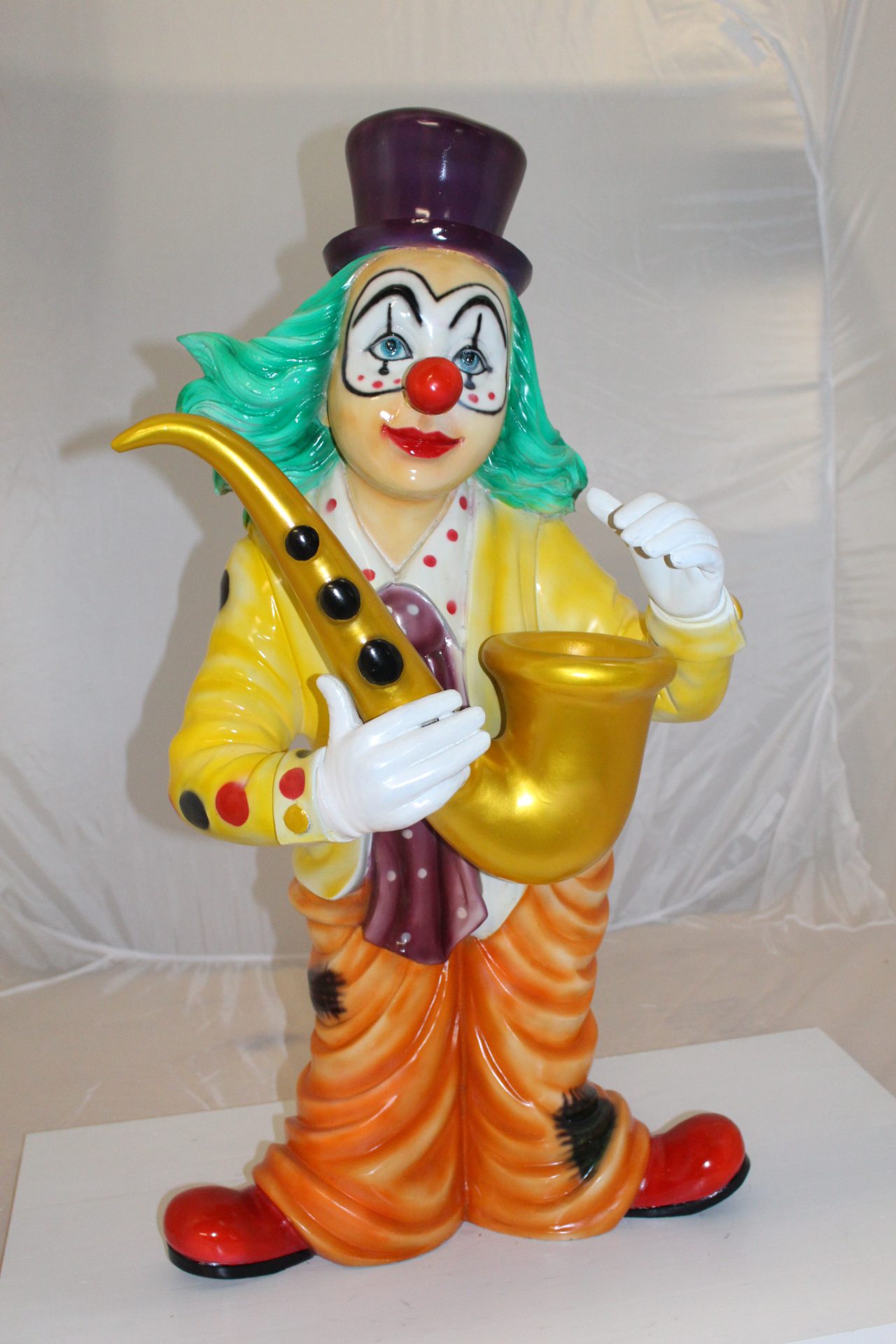 Clown Standing with Saxophone Bronze Statue - Size: 20"L x 15"W x 36"H.