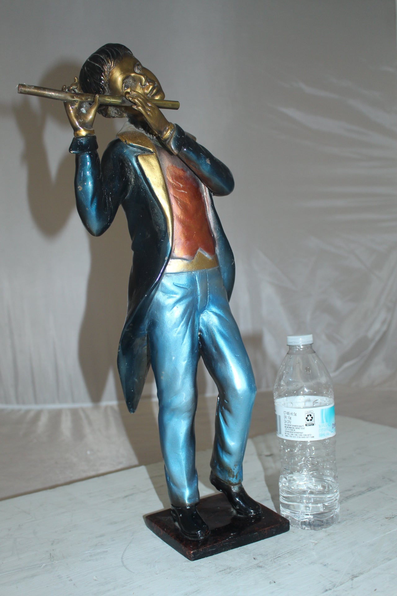 Boy Playing the Flute Bronze Statue - Size: 5"L x 10"W x 19"H.