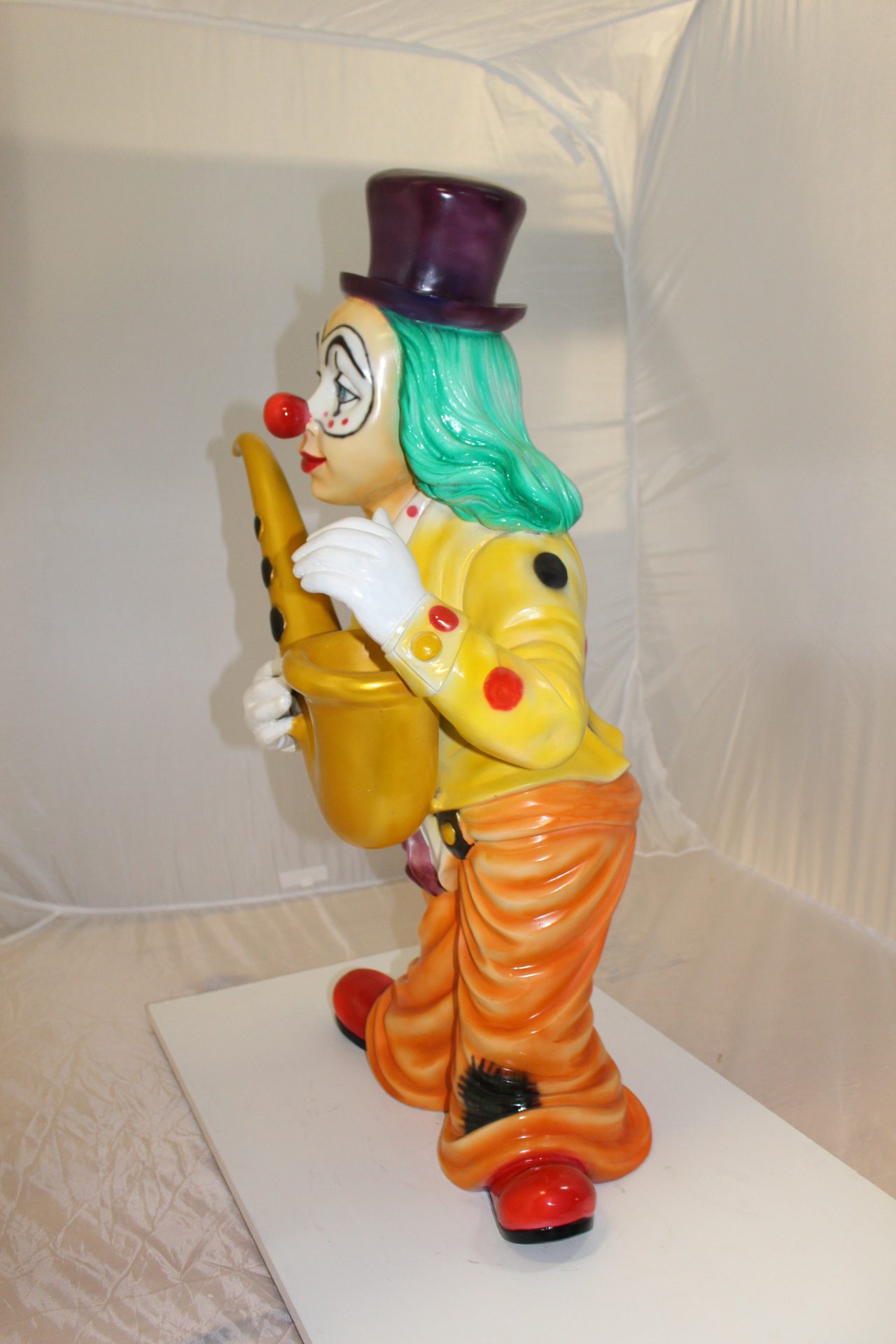 Clown Standing with Saxophone Bronze Statue - Size: 20"L x 15"W x 36"H.