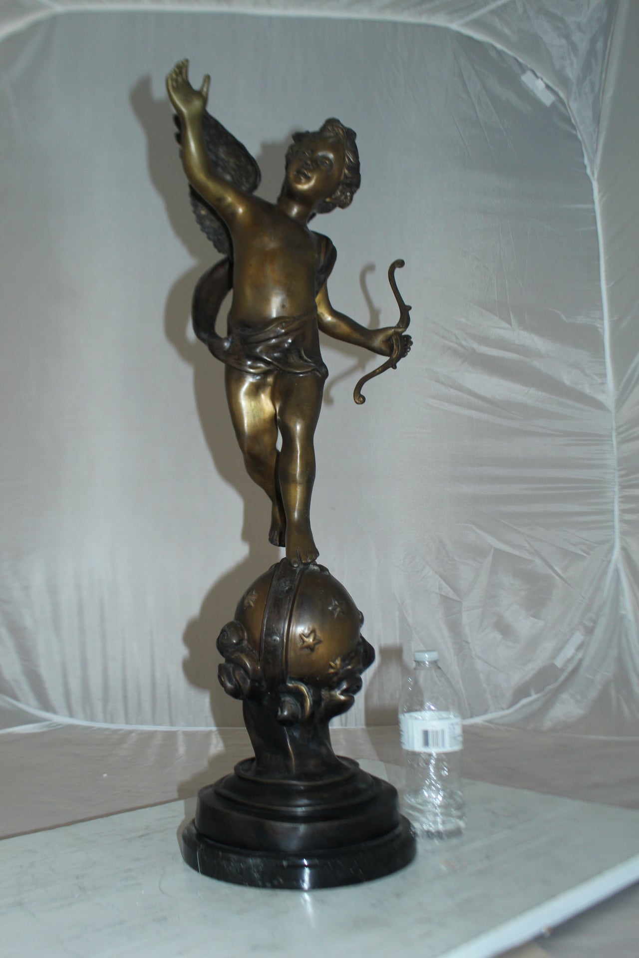 Angel on Earth Bronze Statue - Size: 10"L x 13"W x 32"H.