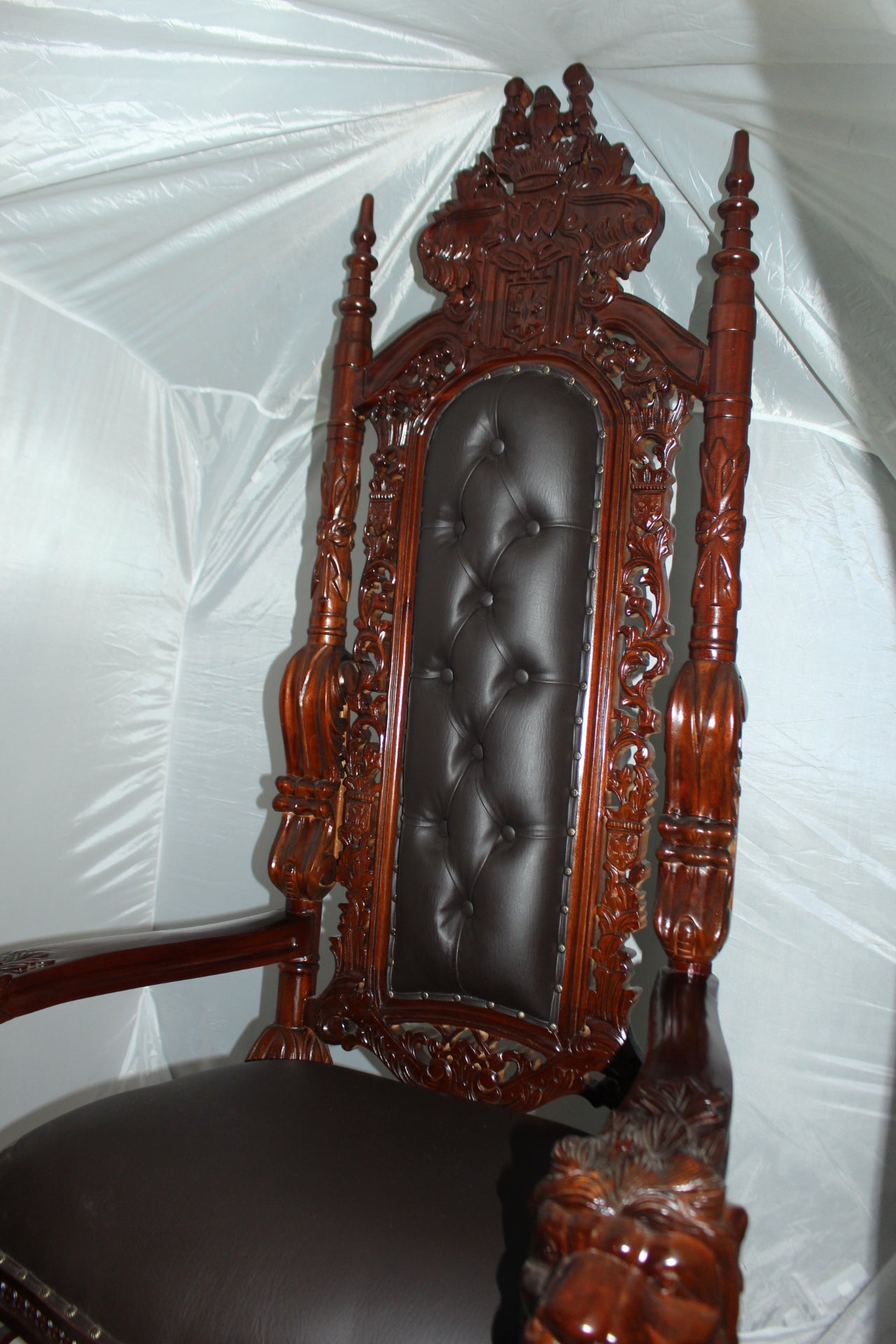 Brown Lion Chair - Size: 70"L x 36"W x 26"H.