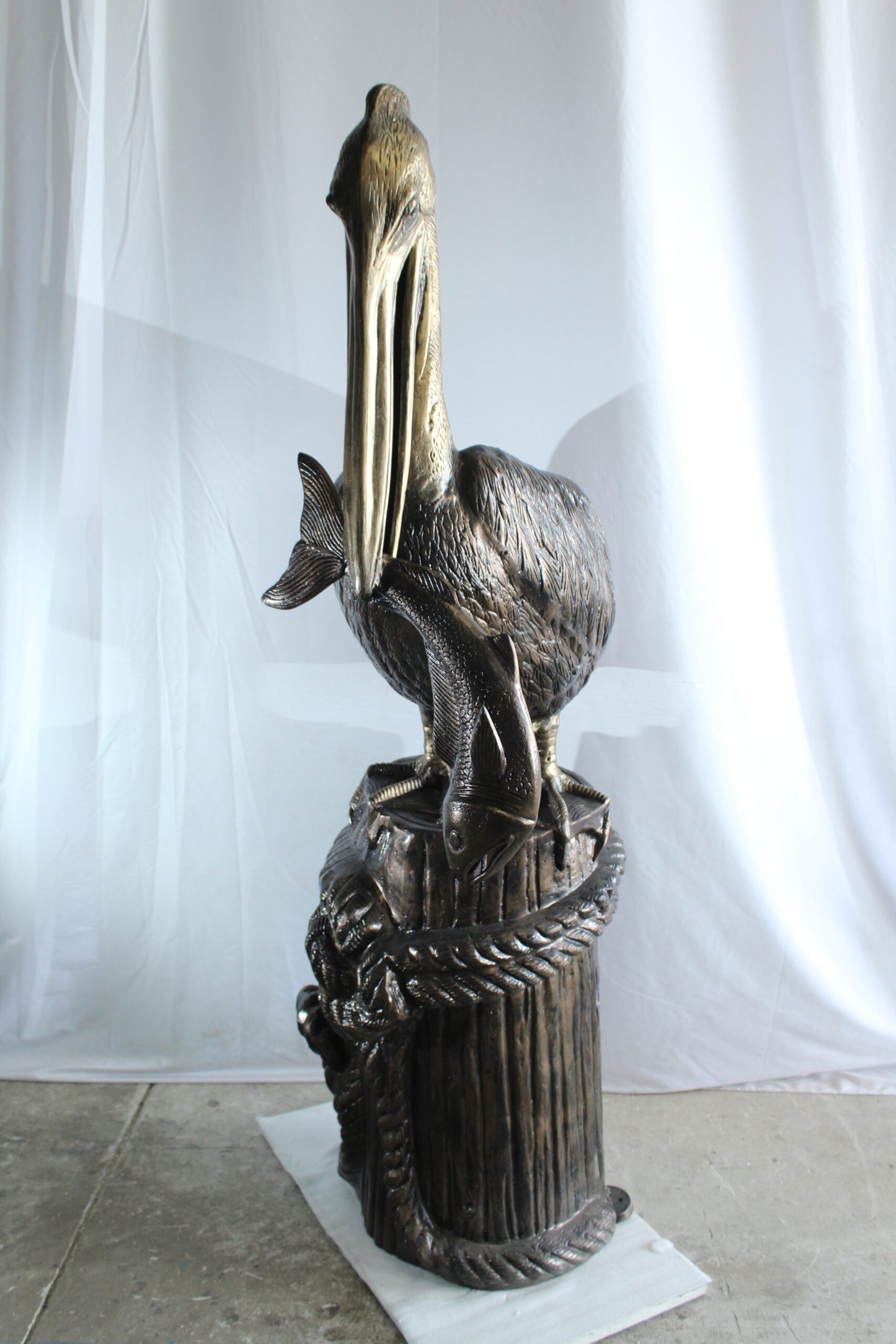 Giant Aluminum Pelican Statue Catching Fish on Dock Post 40" x 33" x 78"H