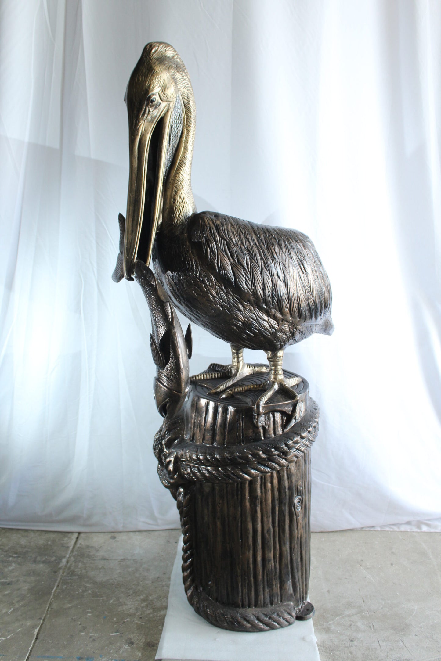Giant Aluminum Pelican Statue Catching Fish on Dock Post 40" x 33" x 78"H
