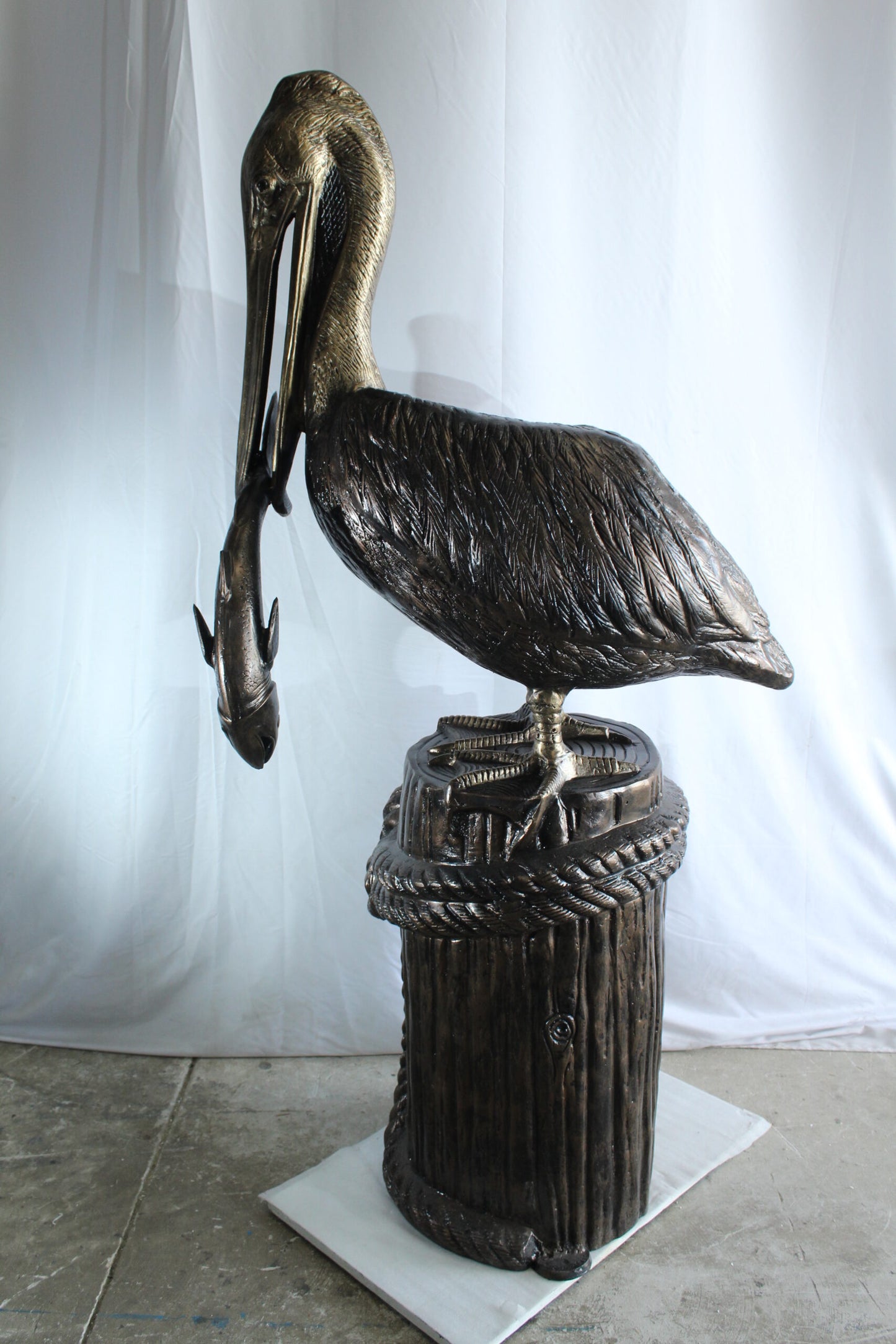 Giant Aluminum Pelican Statue Catching Fish on Dock Post 40" x 33" x 78"H