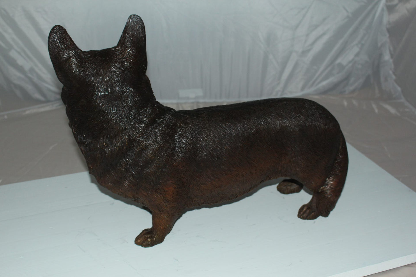 Corgi dog standing Bronze Statue - Size: 20"L x 8"W x 15"H.