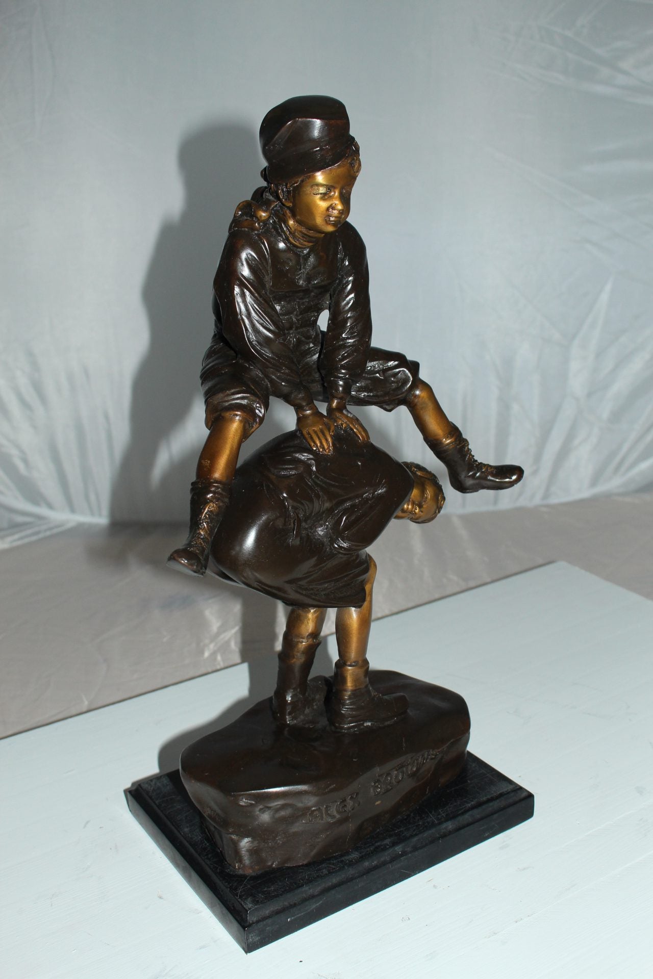 Leapfrog Bronze Statue - Size: 12"L x 7"W x 19"H.