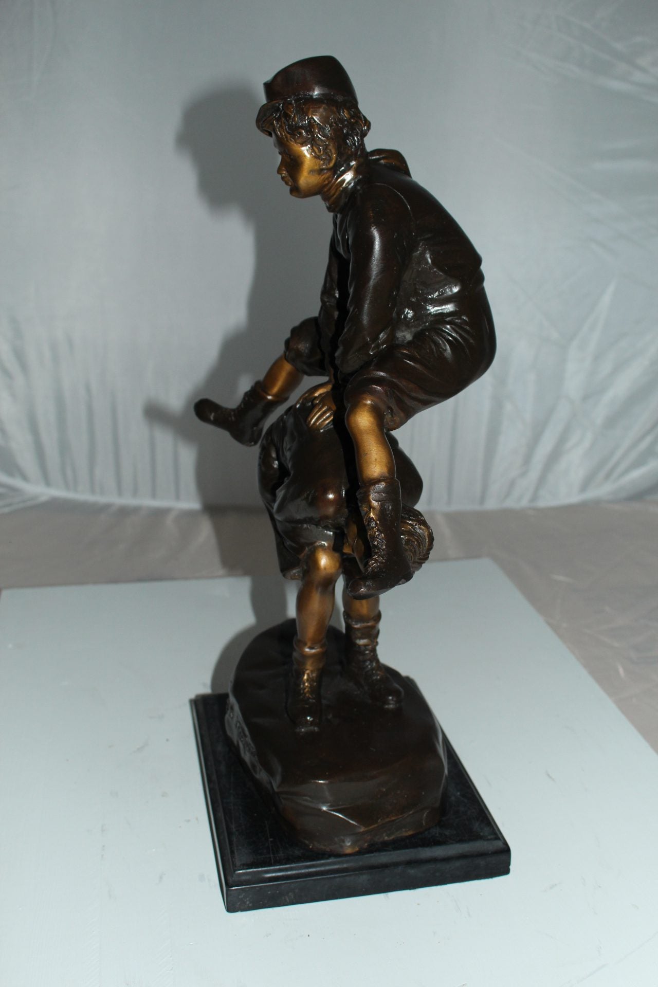 Leapfrog Bronze Statue - Size: 12"L x 7"W x 19"H.