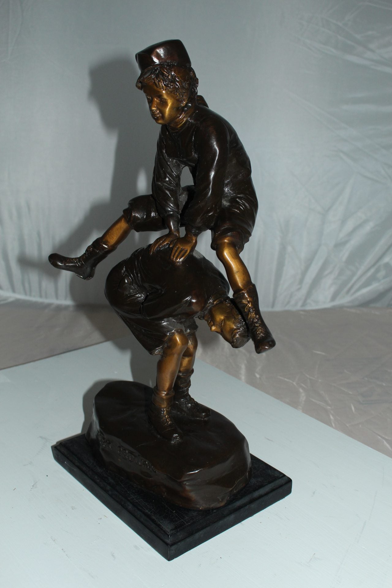 Leapfrog Bronze Statue - Size: 12"L x 7"W x 19"H.