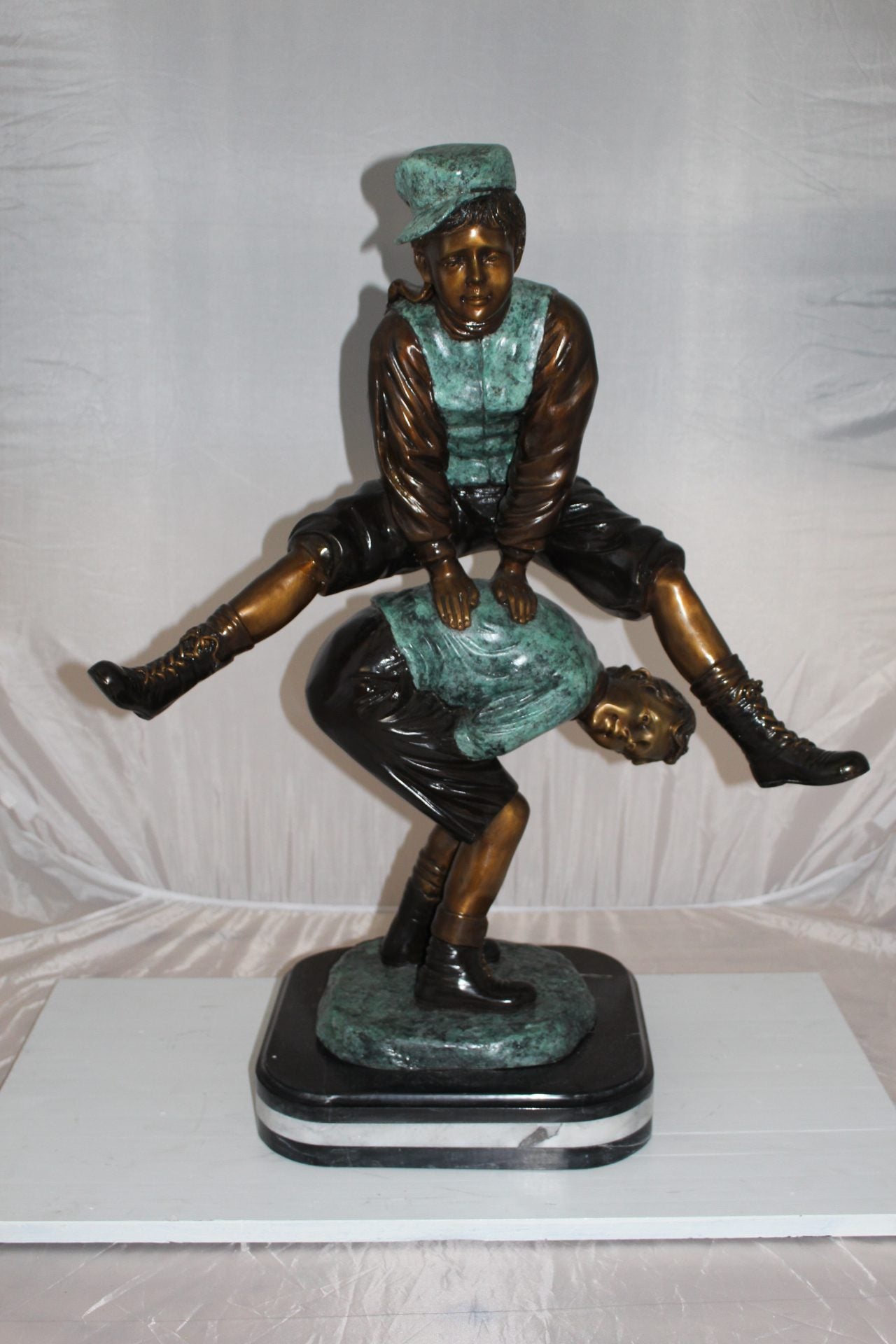 Leapfrog - large Bronze Statue - Size: 26"L x 14"W x 34"H.