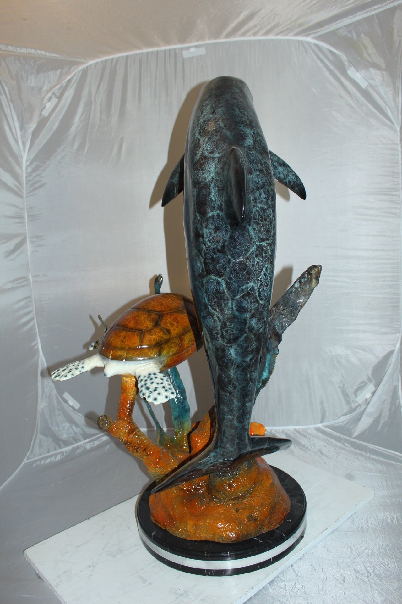 Dolphin with large turtle Bronze Statue - Size: 30"L x 30"W x 44"H.