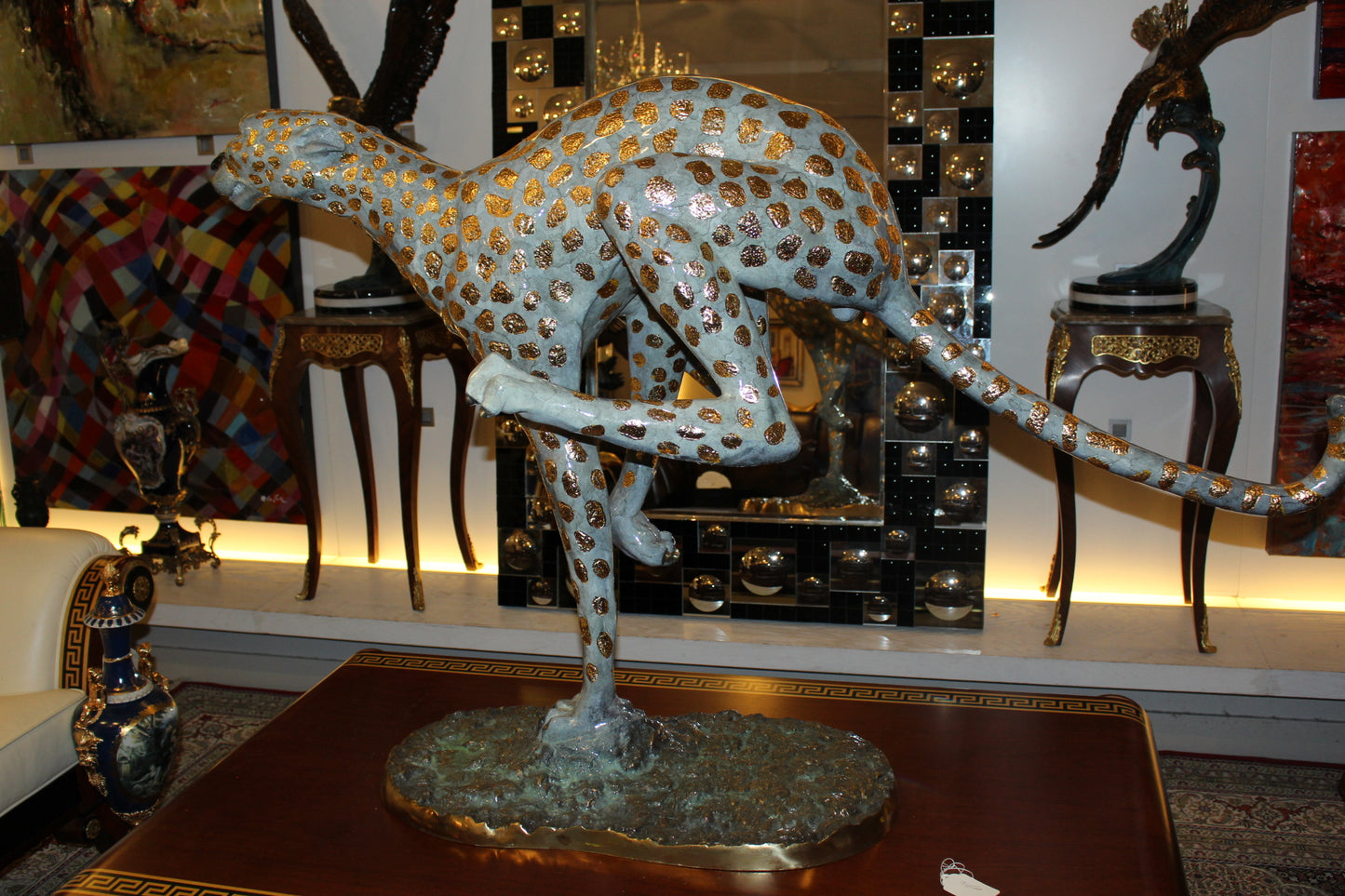 Running Cheetah - Gold Pleated Bronze Statue - Size: 67"L x 23"W x 41"H.
