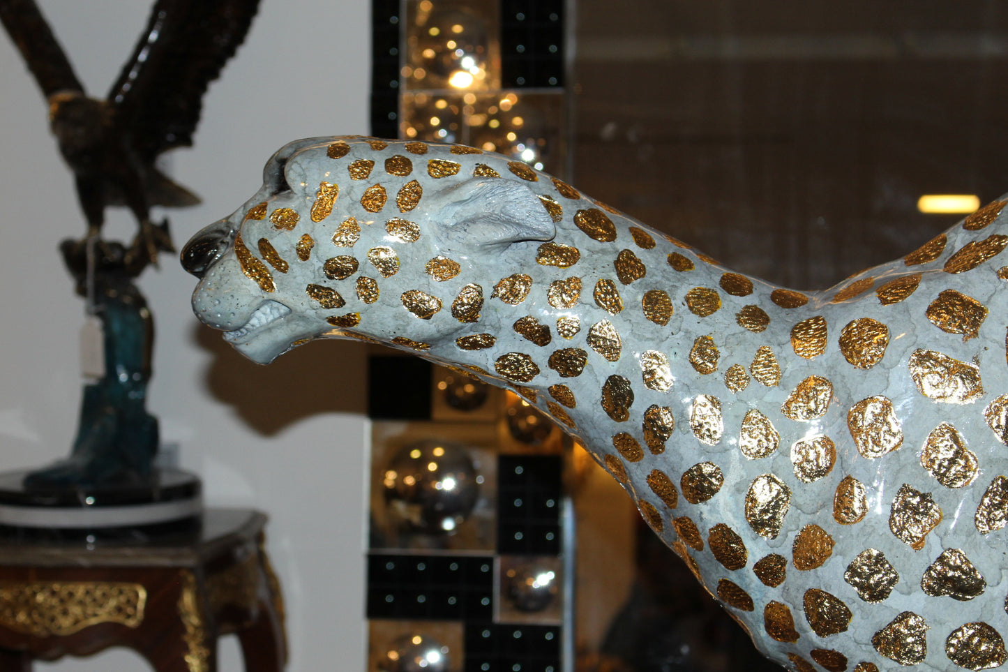 Running Cheetah - Gold Pleated Bronze Statue - Size: 67"L x 23"W x 41"H.