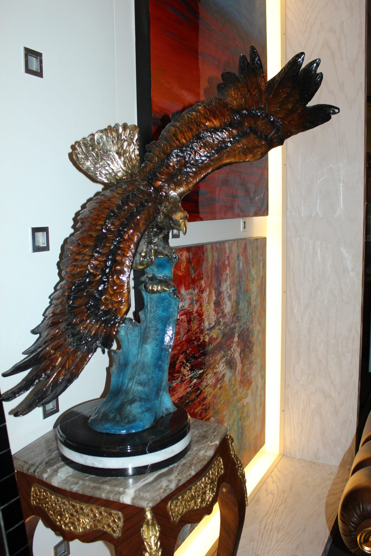 Eagle on a wave - Bronze Statue - Size: 32"L x 12"W x 34"H.