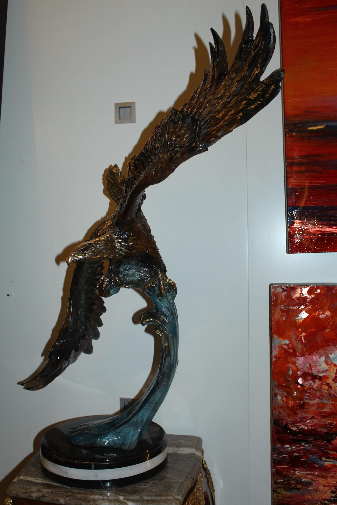 Eagle on a wave - Bronze Statue - Size: 32"L x 12"W x 34"H.