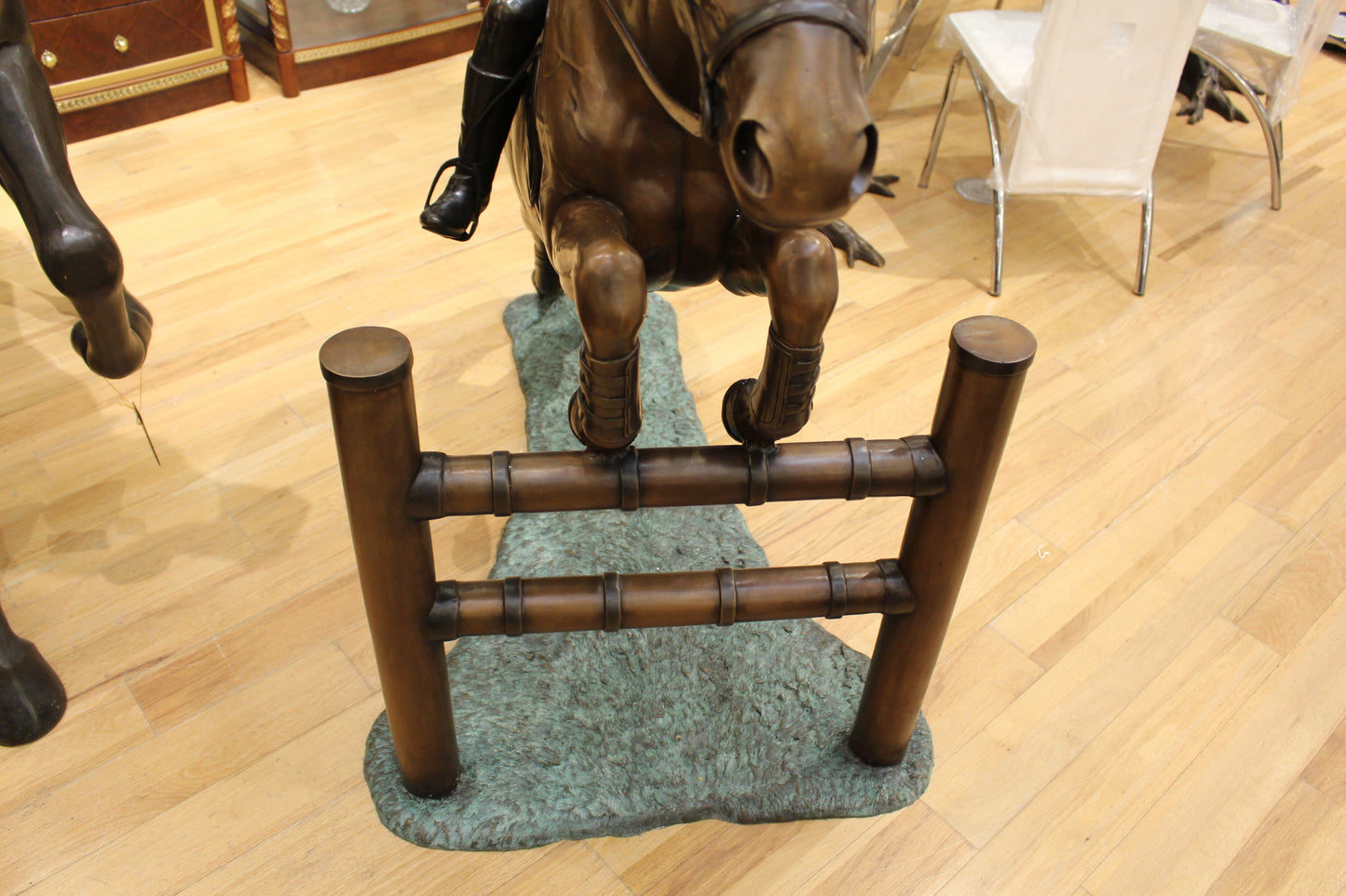 Jockey and Horse Jump a Fence Bronze Statue -  Size: 60"L x 30"W x 51"H.