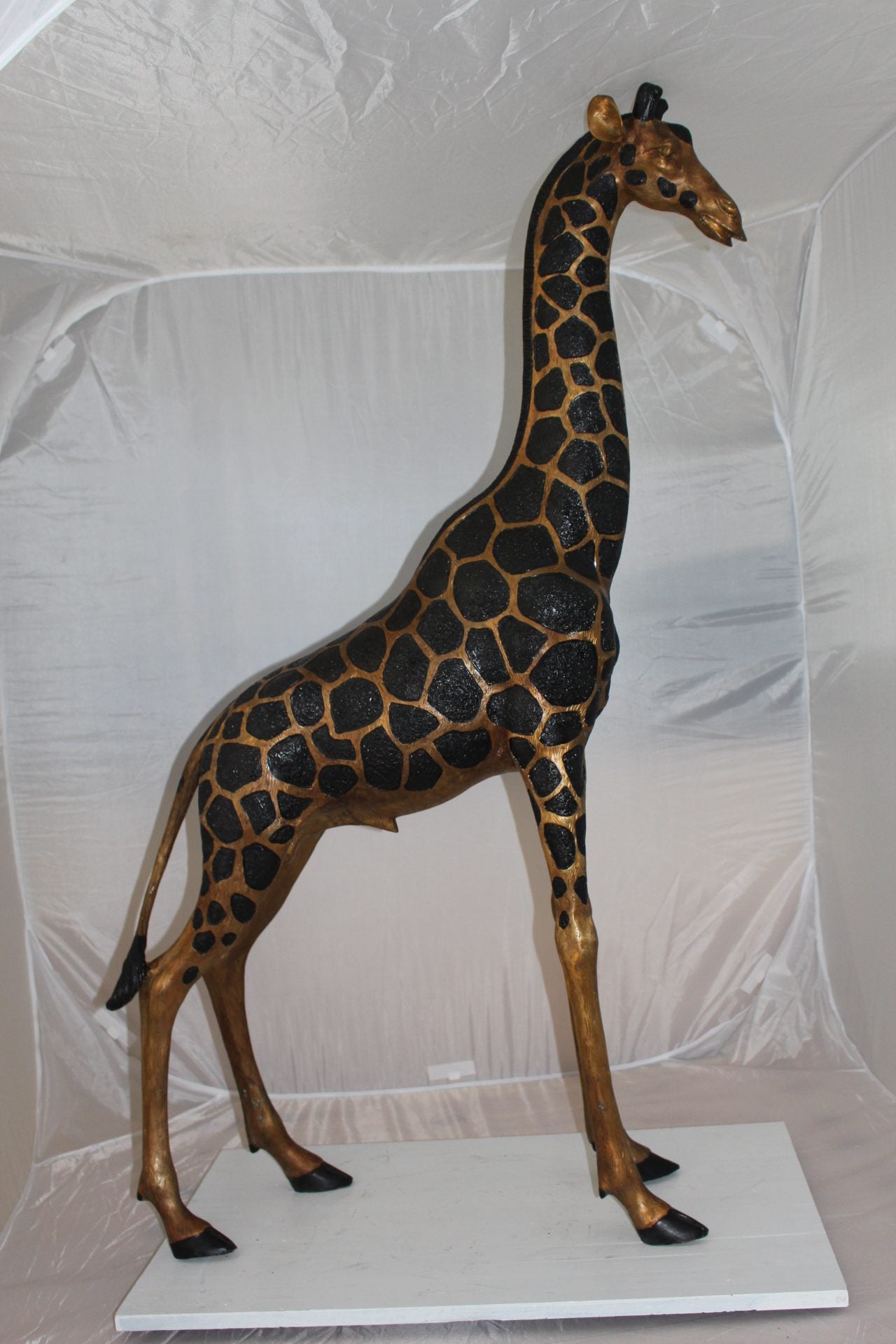 Pair of Giraffes Bronze Statues -  Size: 32"L x 12"W x 55"H.