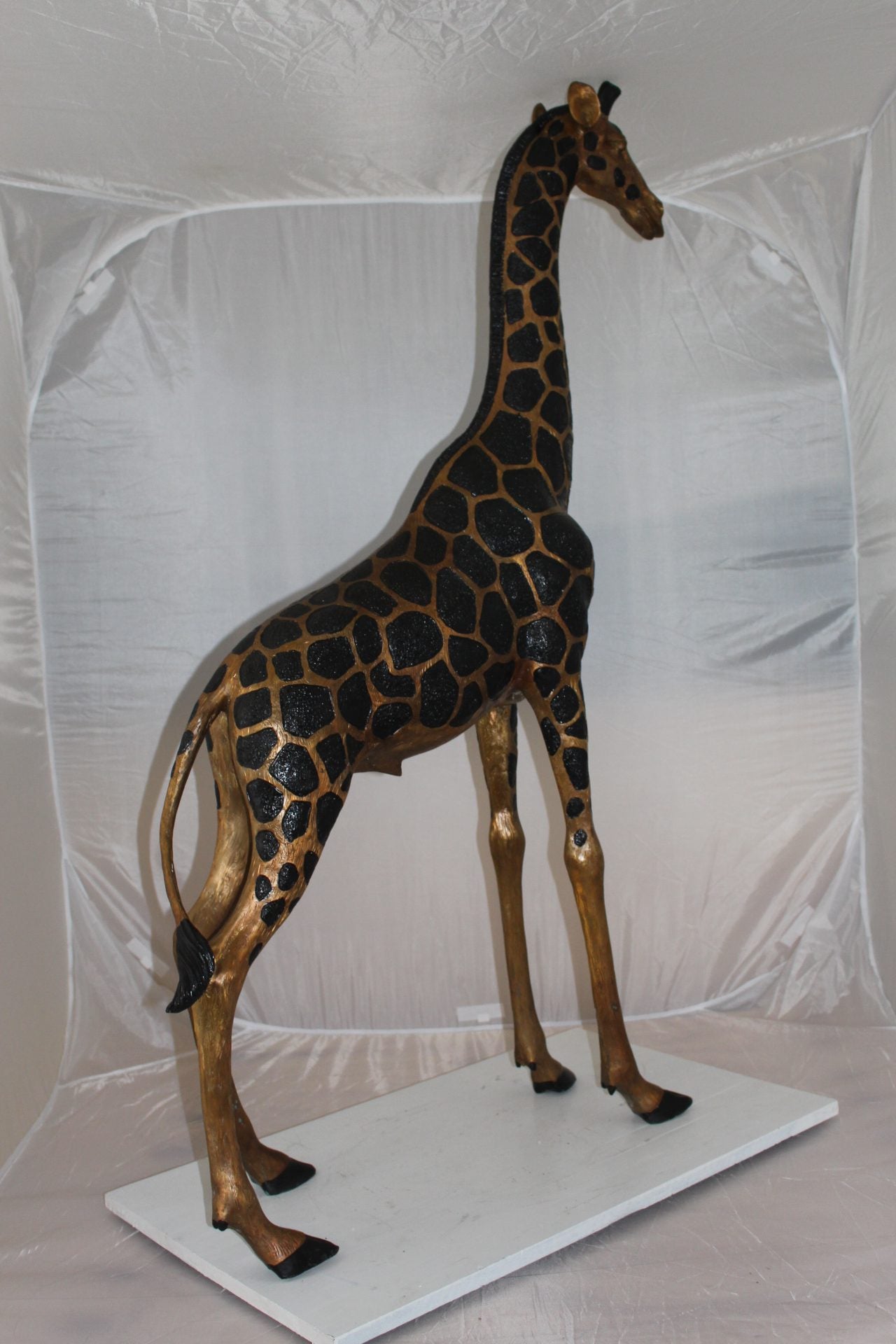 Pair of Giraffes Bronze Statues -  Size: 32"L x 12"W x 55"H.