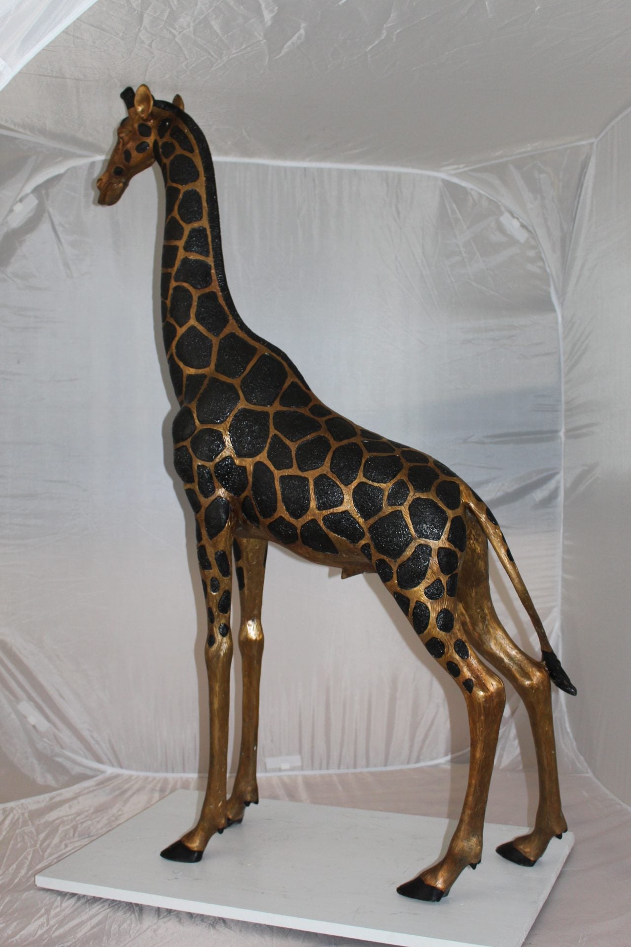 Pair of Giraffes Bronze Statues -  Size: 32"L x 12"W x 55"H.