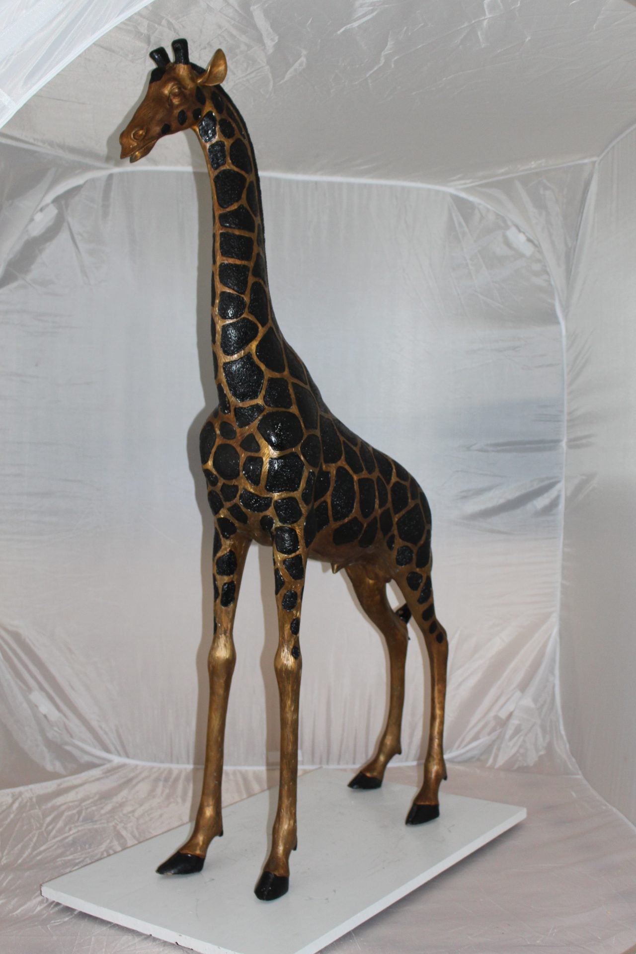 Pair of Giraffes Bronze Statues -  Size: 32"L x 12"W x 55"H.