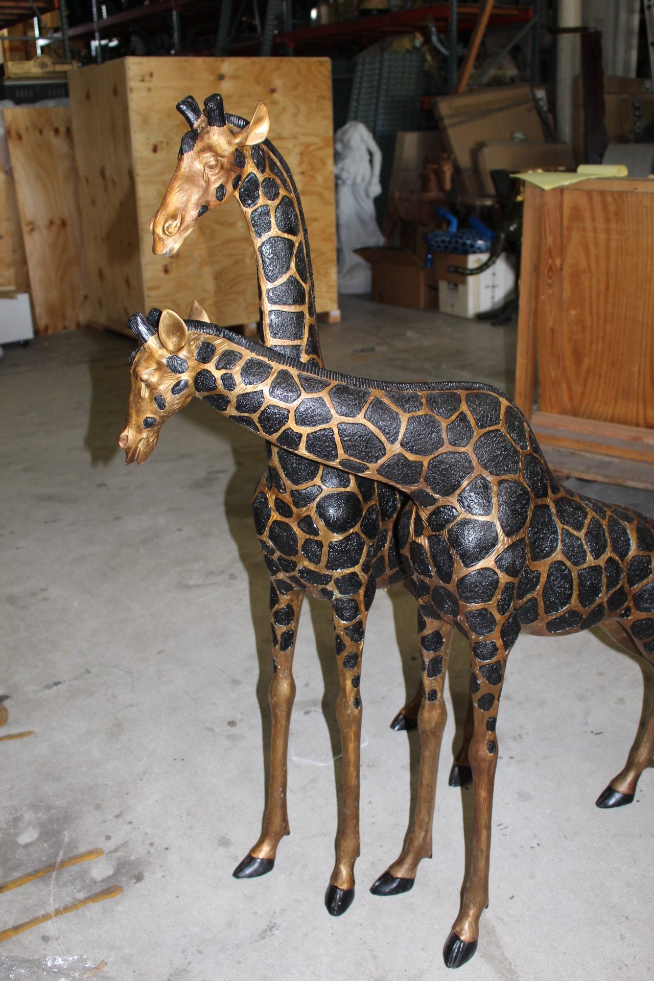 Pair of Giraffes Bronze Statues -  Size: 32"L x 12"W x 55"H.
