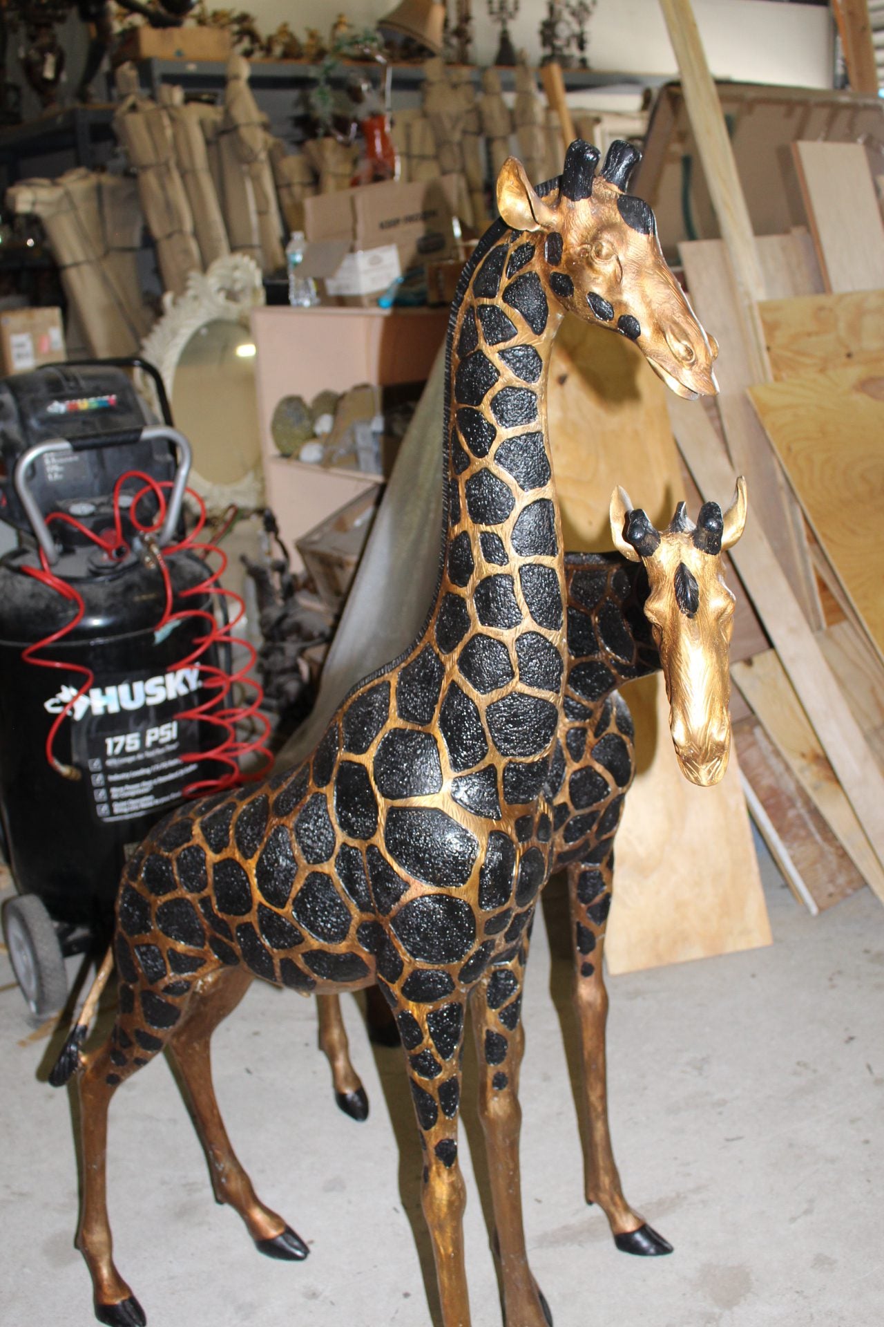 Pair of Giraffes Bronze Statues -  Size: 32"L x 12"W x 55"H.