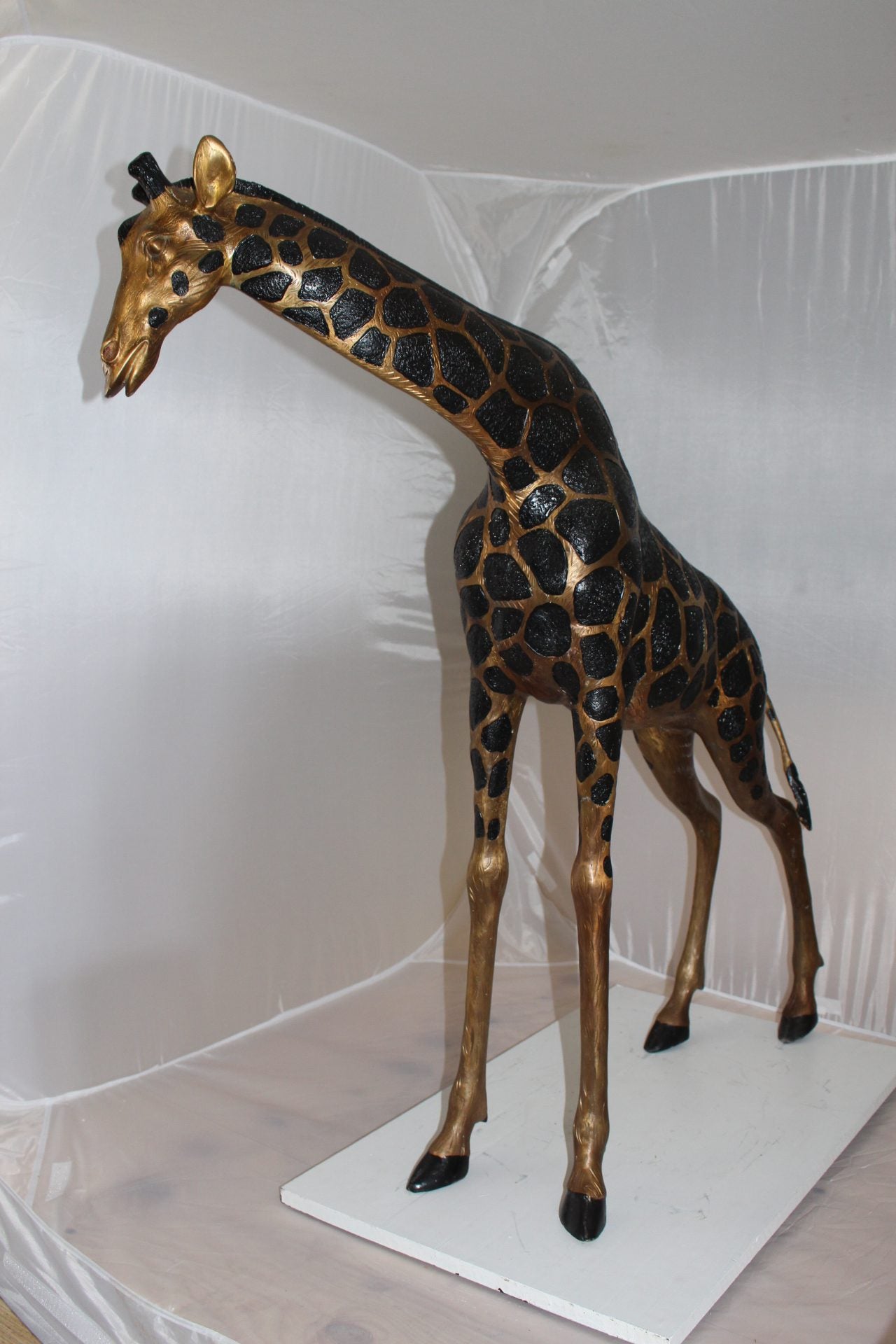 Pair of Giraffes Bronze Statues -  Size: 32"L x 12"W x 55"H.