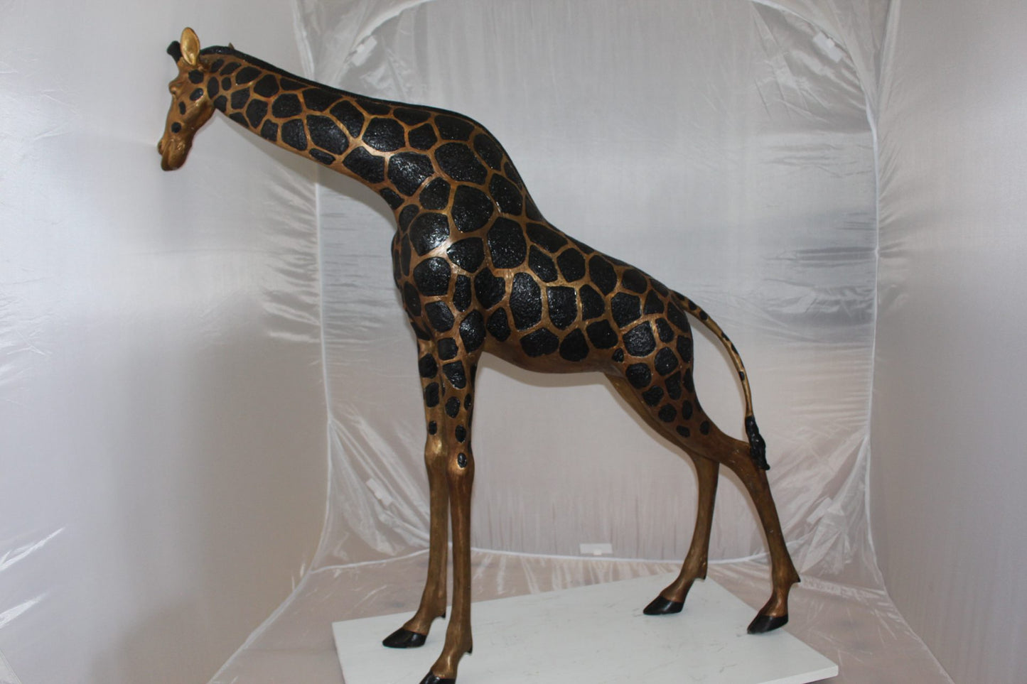 Pair of Giraffes Bronze Statues -  Size: 32"L x 12"W x 55"H.