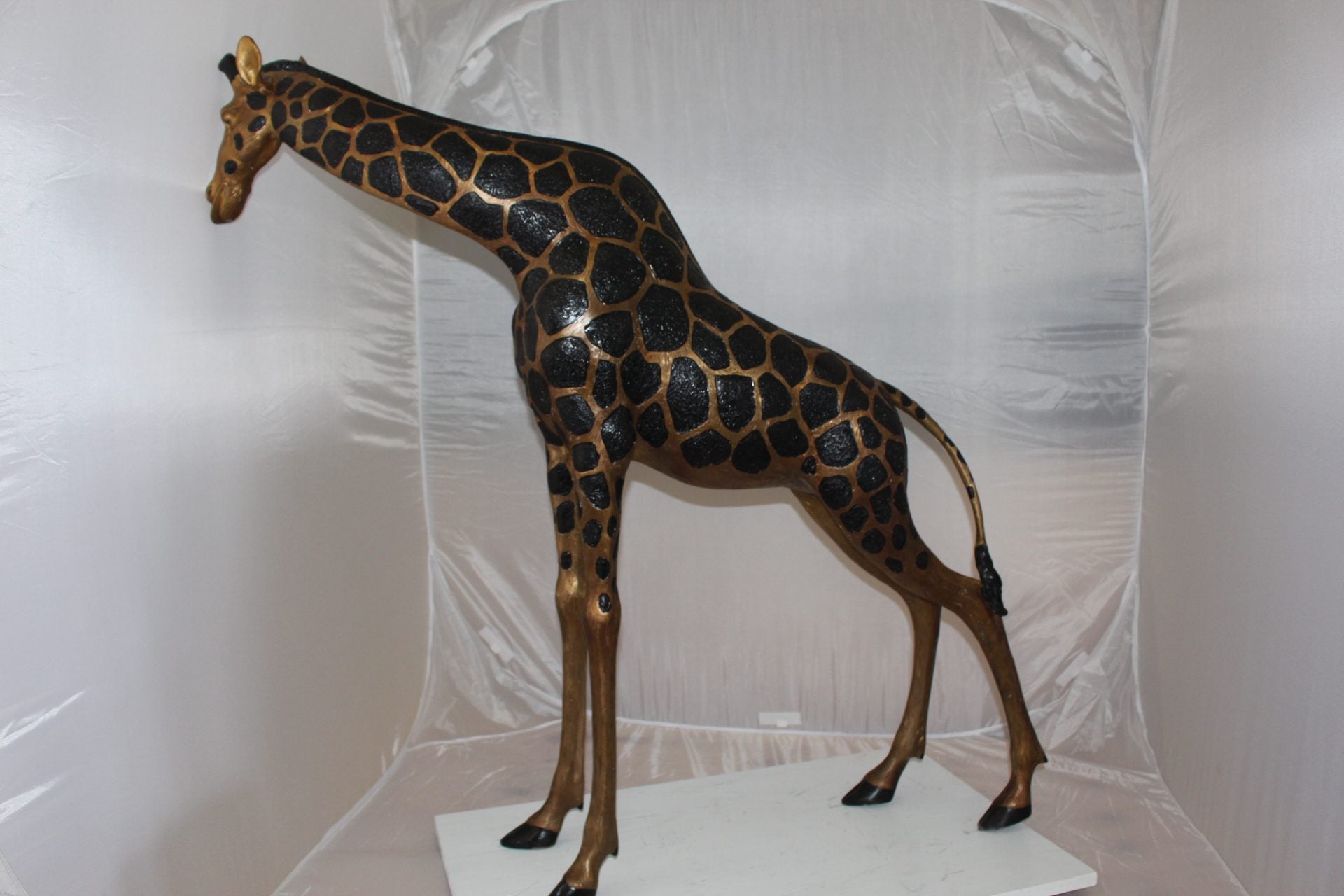 Pair of Giraffes Bronze Statues -  Size: 32"L x 12"W x 55"H.