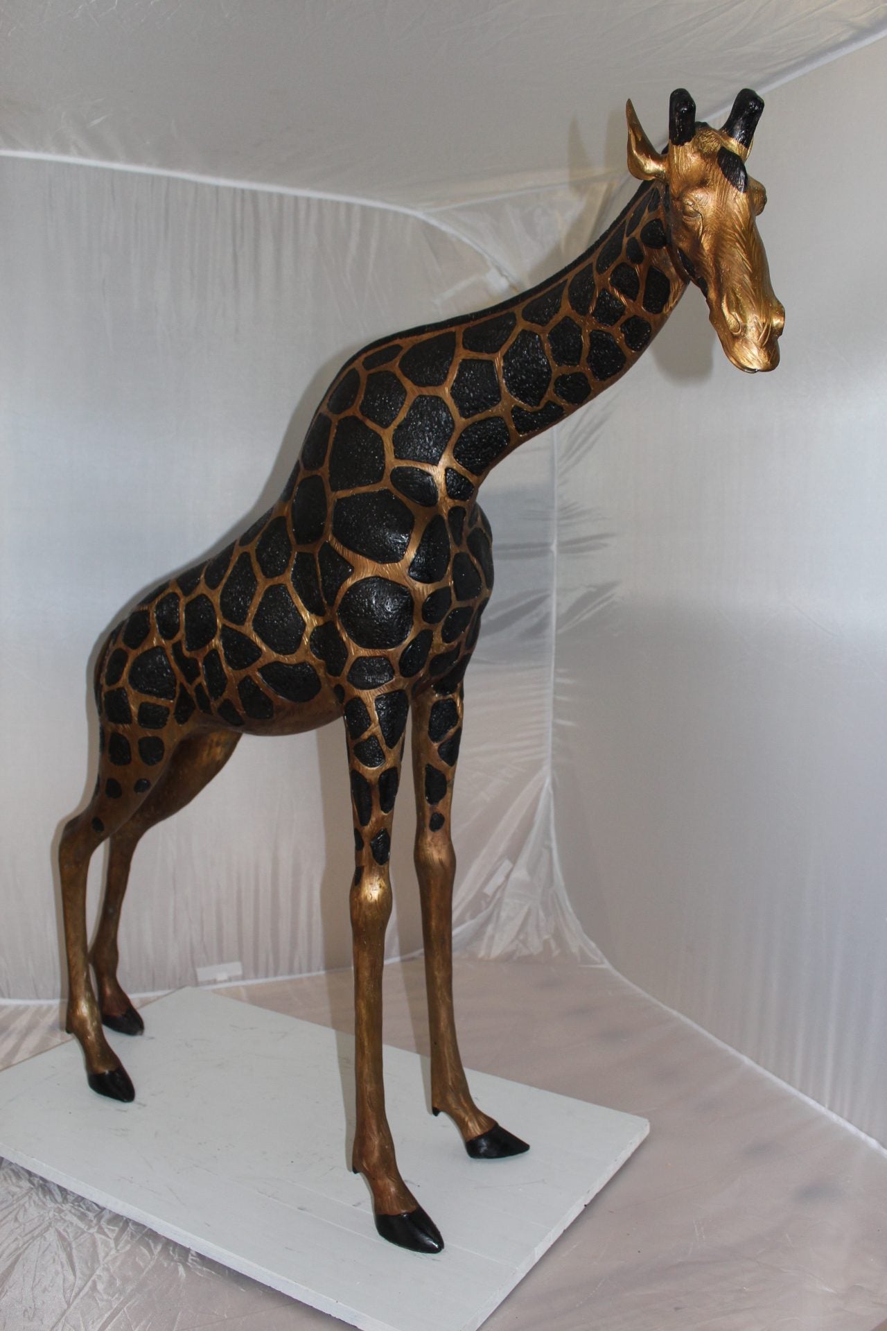 Pair of Giraffes Bronze Statues -  Size: 32"L x 12"W x 55"H.
