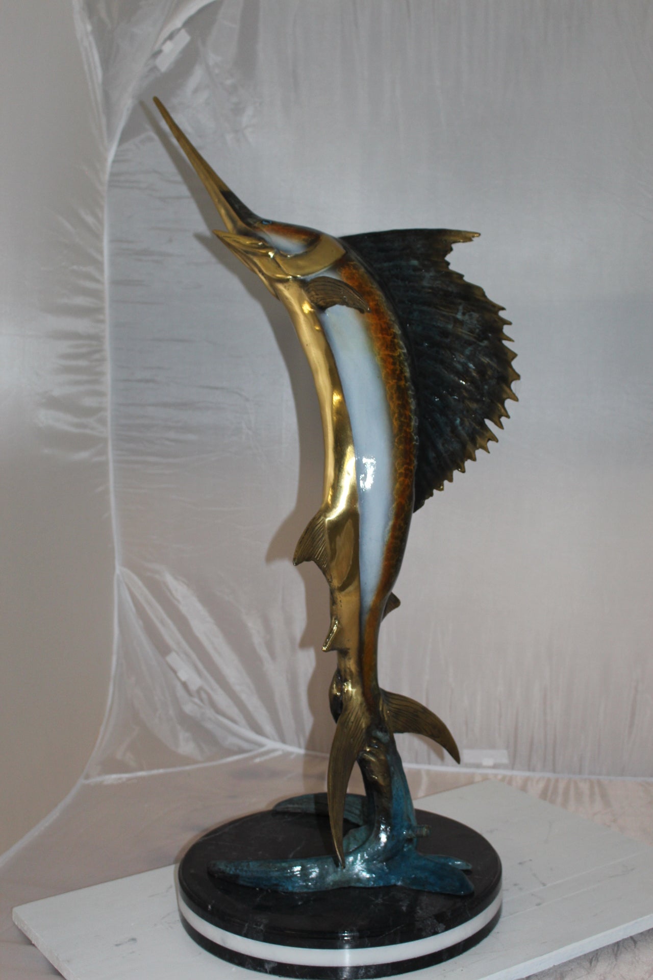 One Sailfish Bronze Statue - Size: 18"L x 18"W x 43"H.