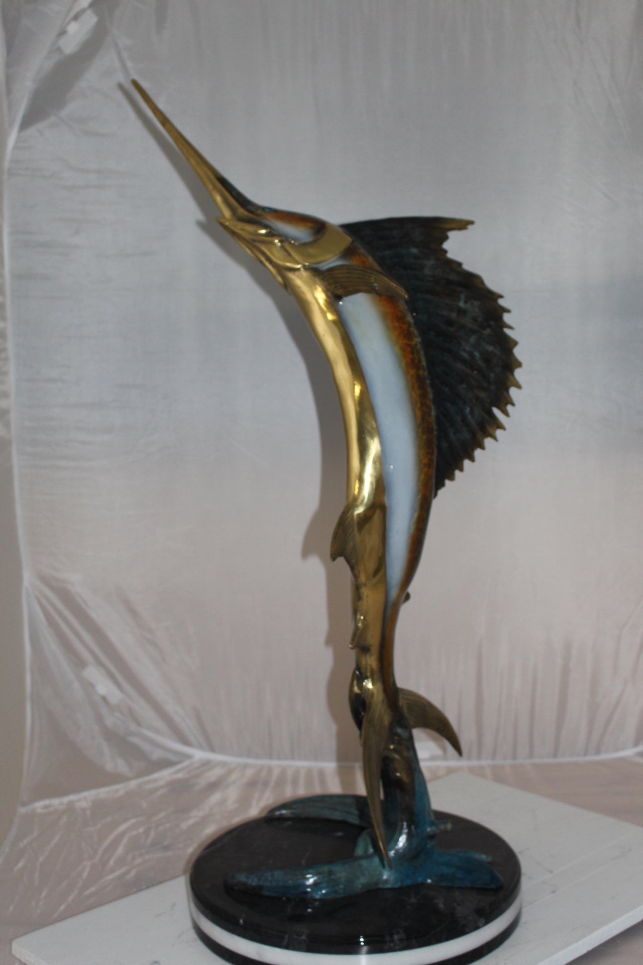 One Sailfish Bronze Statue - Size: 18"L x 18"W x 43"H.
