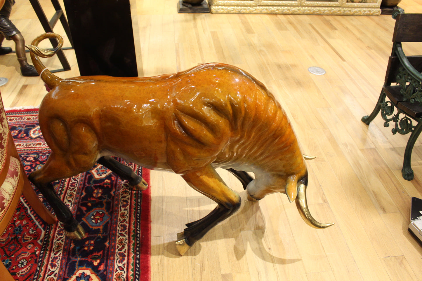 Bull Heads Down -Large Bronze Statue - Size: 48"L x 12"W x 30"H.