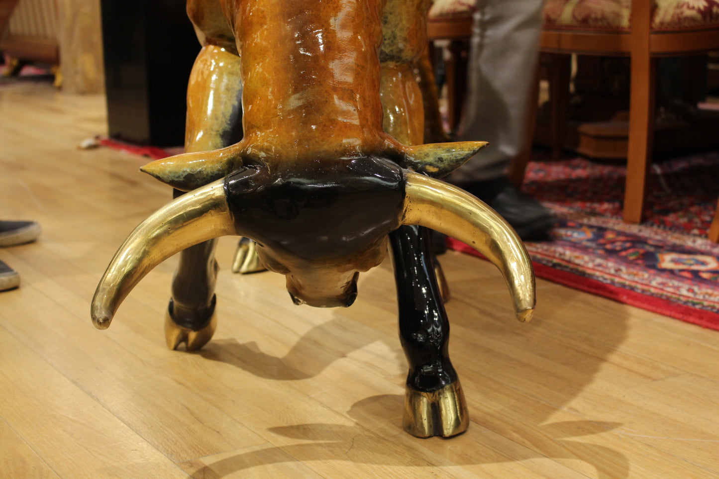 Bull Heads Down -Large Bronze Statue - Size: 48"L x 12"W x 30"H.