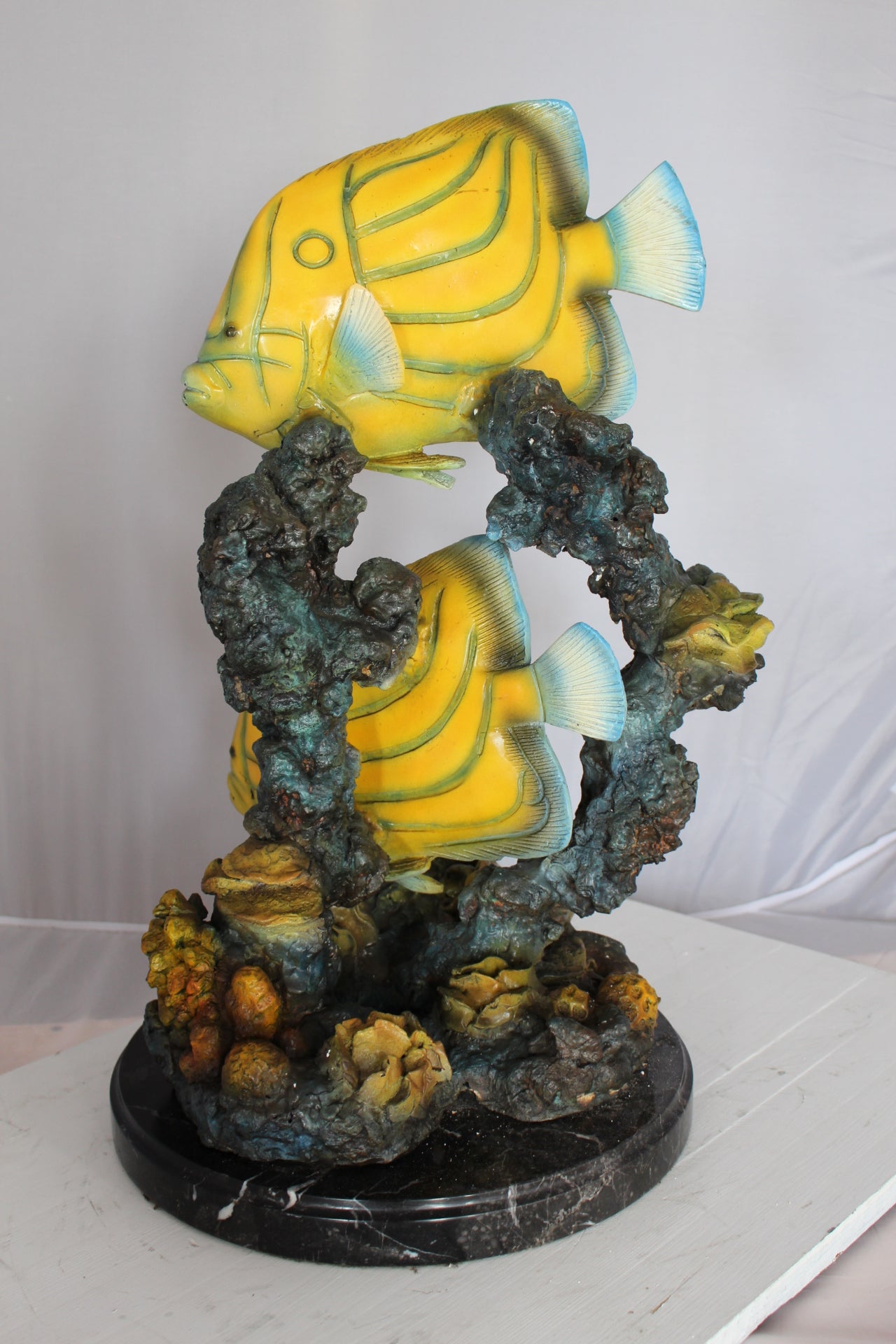 Two Butterfly fish swimming bronze statue - Size: 12"L x 12"W x 24"H.