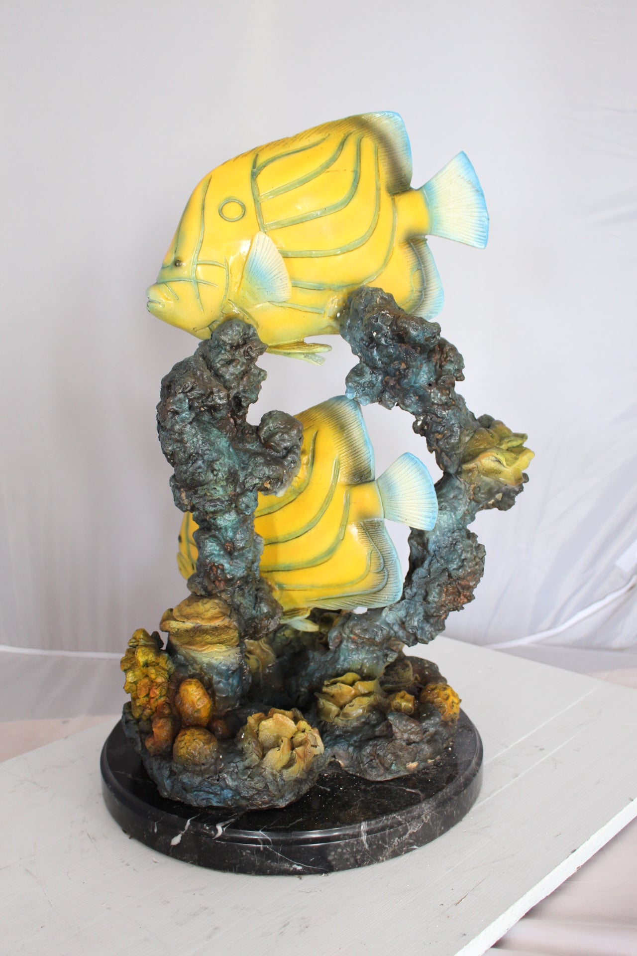 Two Butterfly fish swimming bronze statue - Size: 12"L x 12"W x 24"H.