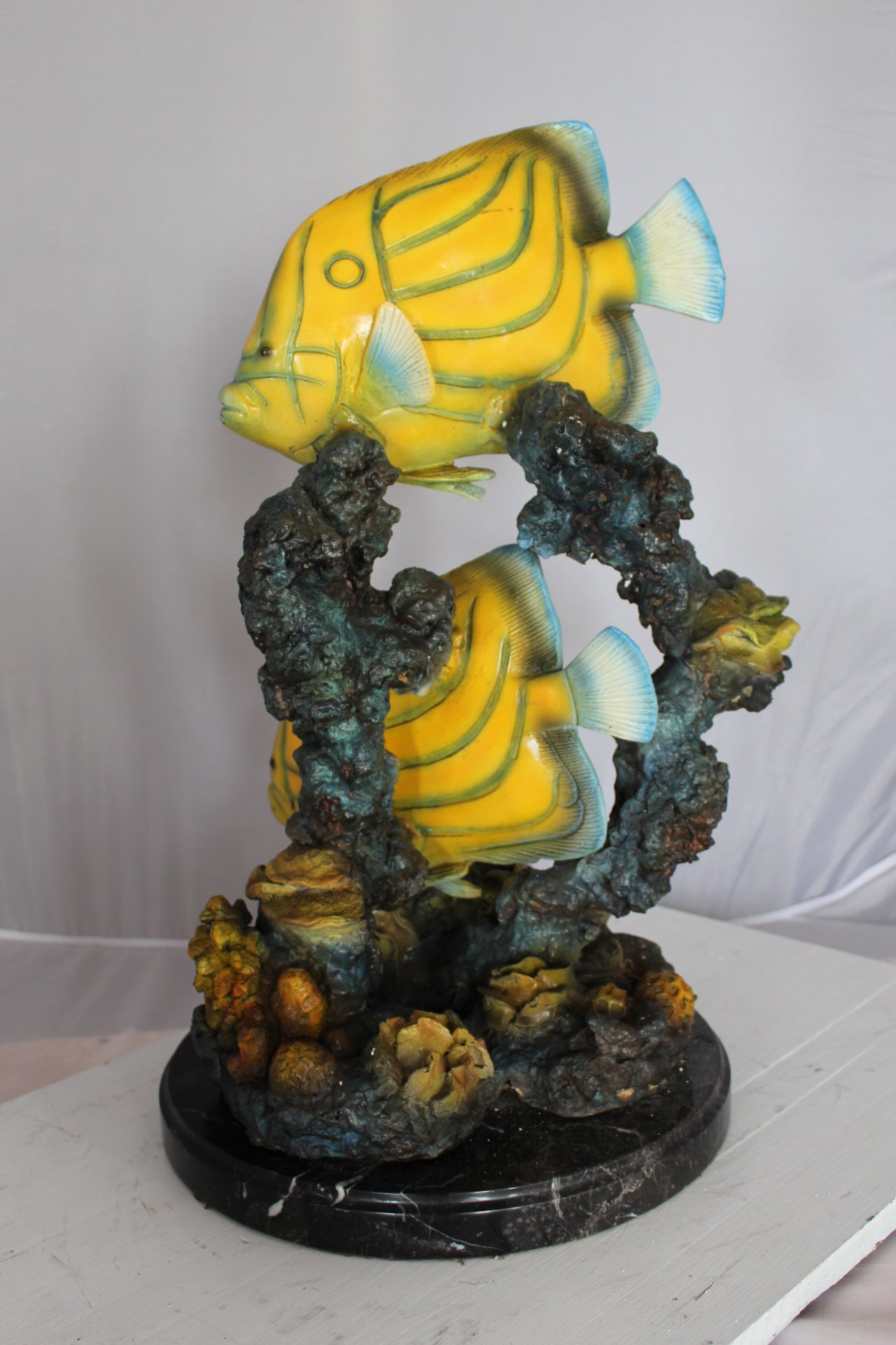 Two Butterfly fish swimming bronze statue - Size: 12"L x 12"W x 24"H.