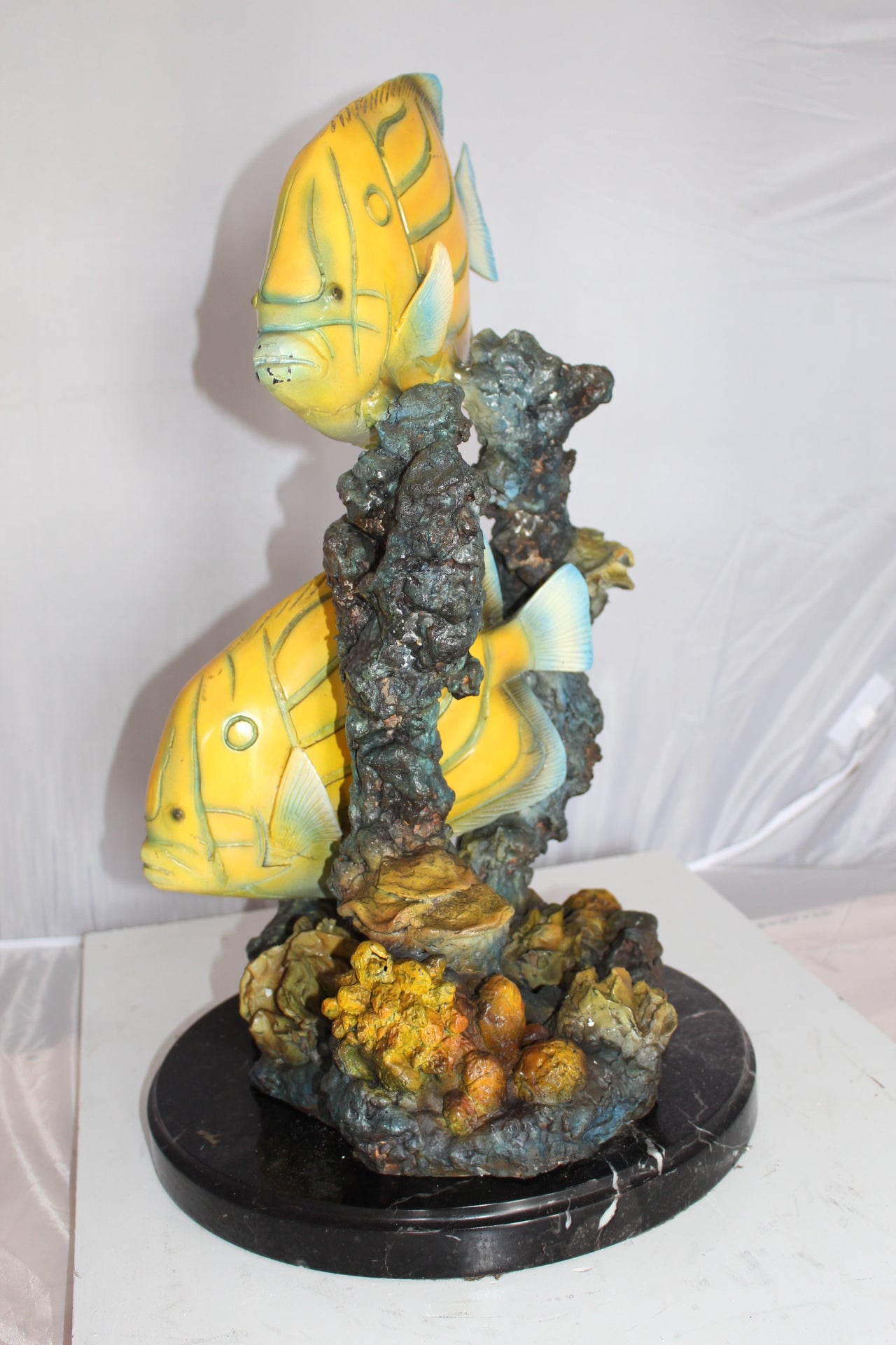 Two Butterfly fish swimming bronze statue - Size: 12"L x 12"W x 24"H.