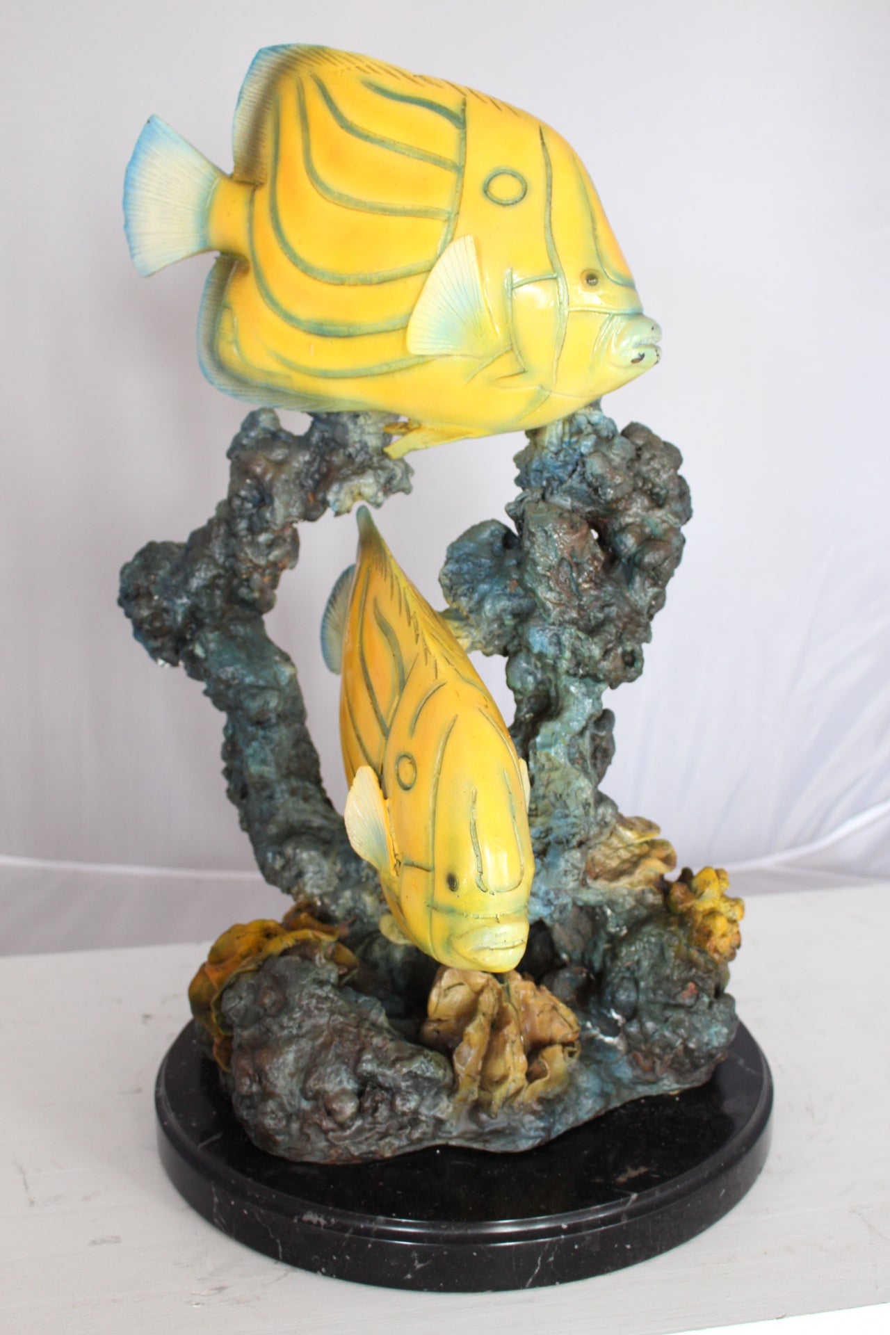 Two Butterfly fish swimming bronze statue - Size: 12"L x 12"W x 24"H.