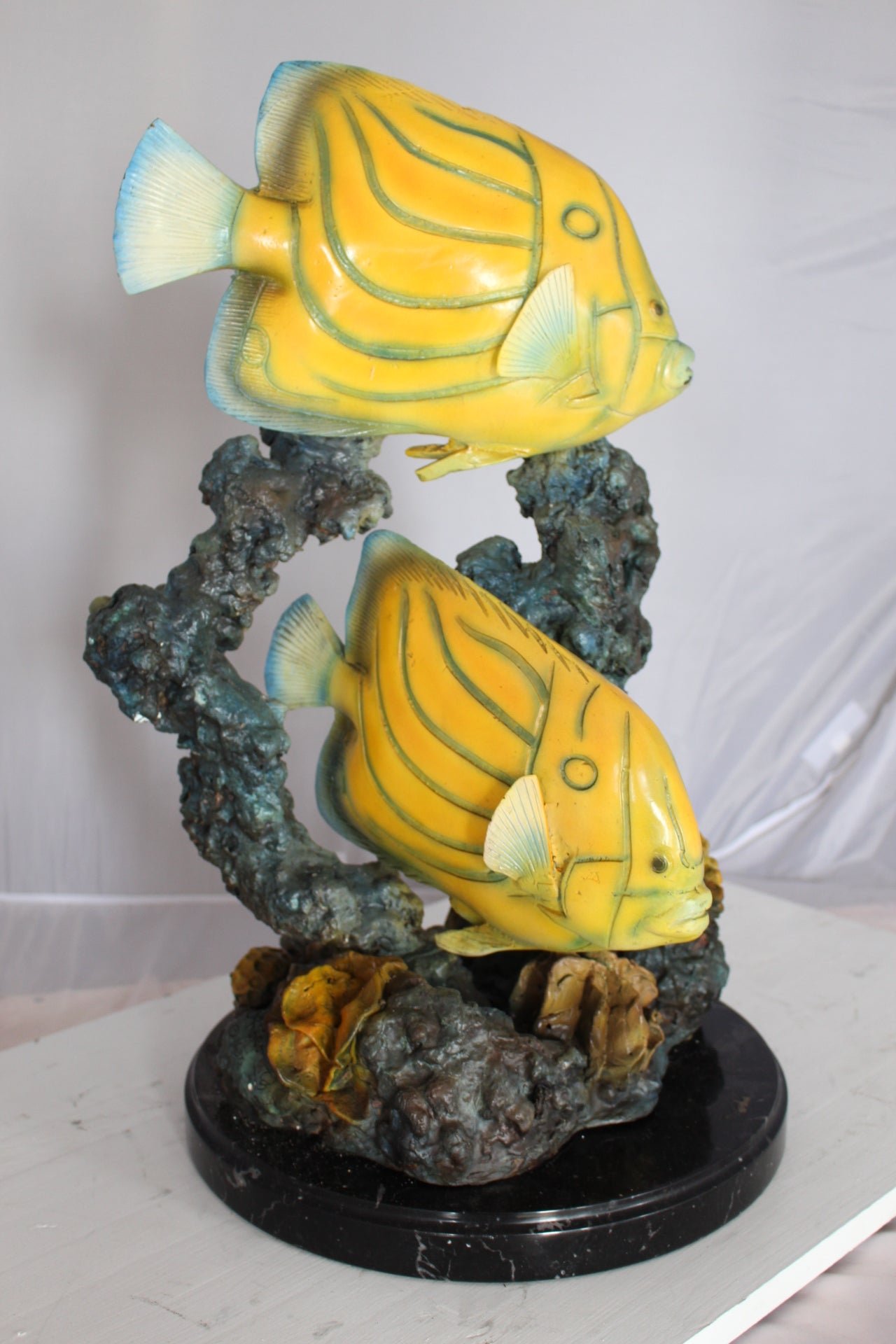 Two Butterfly fish swimming bronze statue - Size: 12"L x 12"W x 24"H.