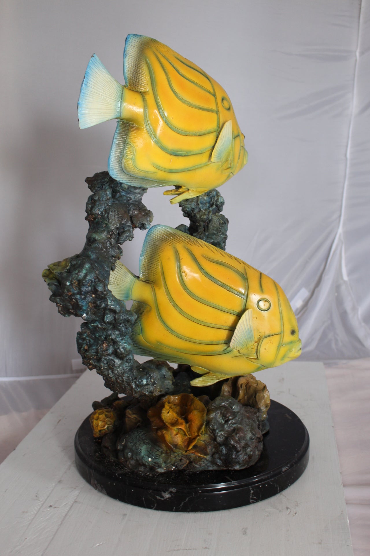 Two Butterfly fish swimming bronze statue - Size: 12"L x 12"W x 24"H.