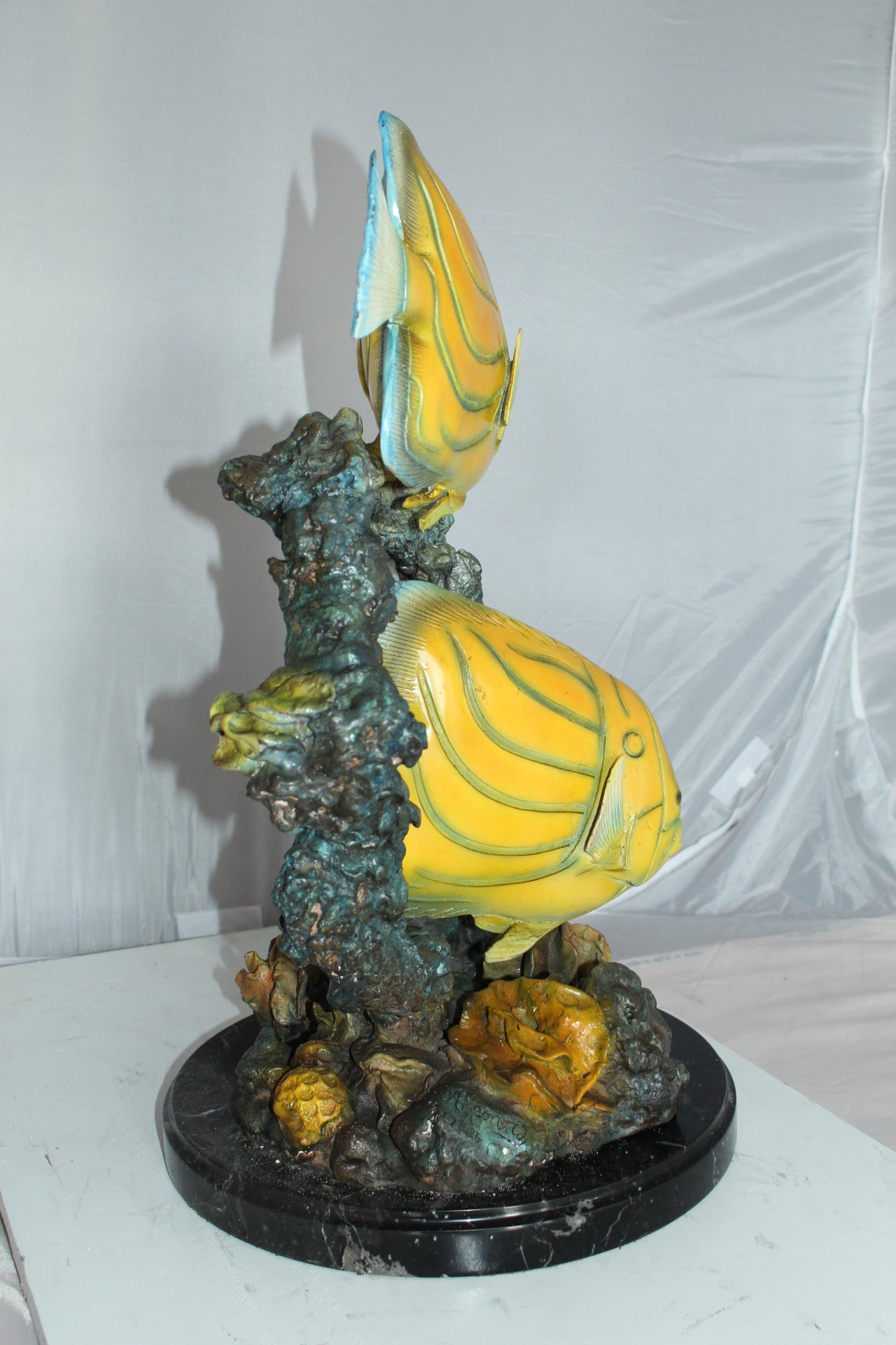 Two Butterfly fish swimming bronze statue - Size: 12"L x 12"W x 24"H.
