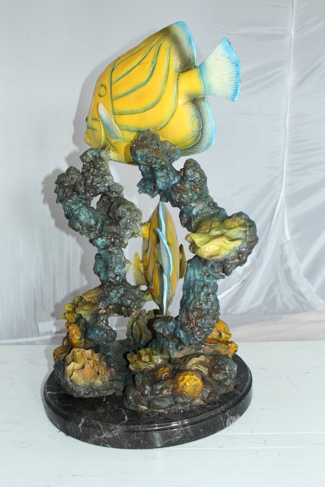 Two Butterfly fish swimming bronze statue - Size: 12"L x 12"W x 24"H.