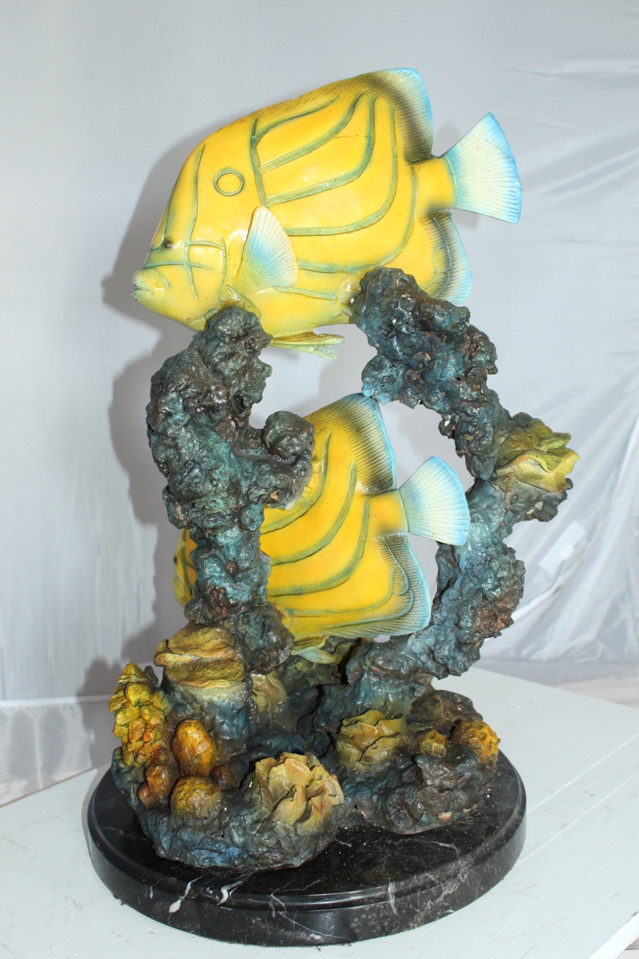 Two Butterfly fish swimming bronze statue - Size: 12"L x 12"W x 24"H.