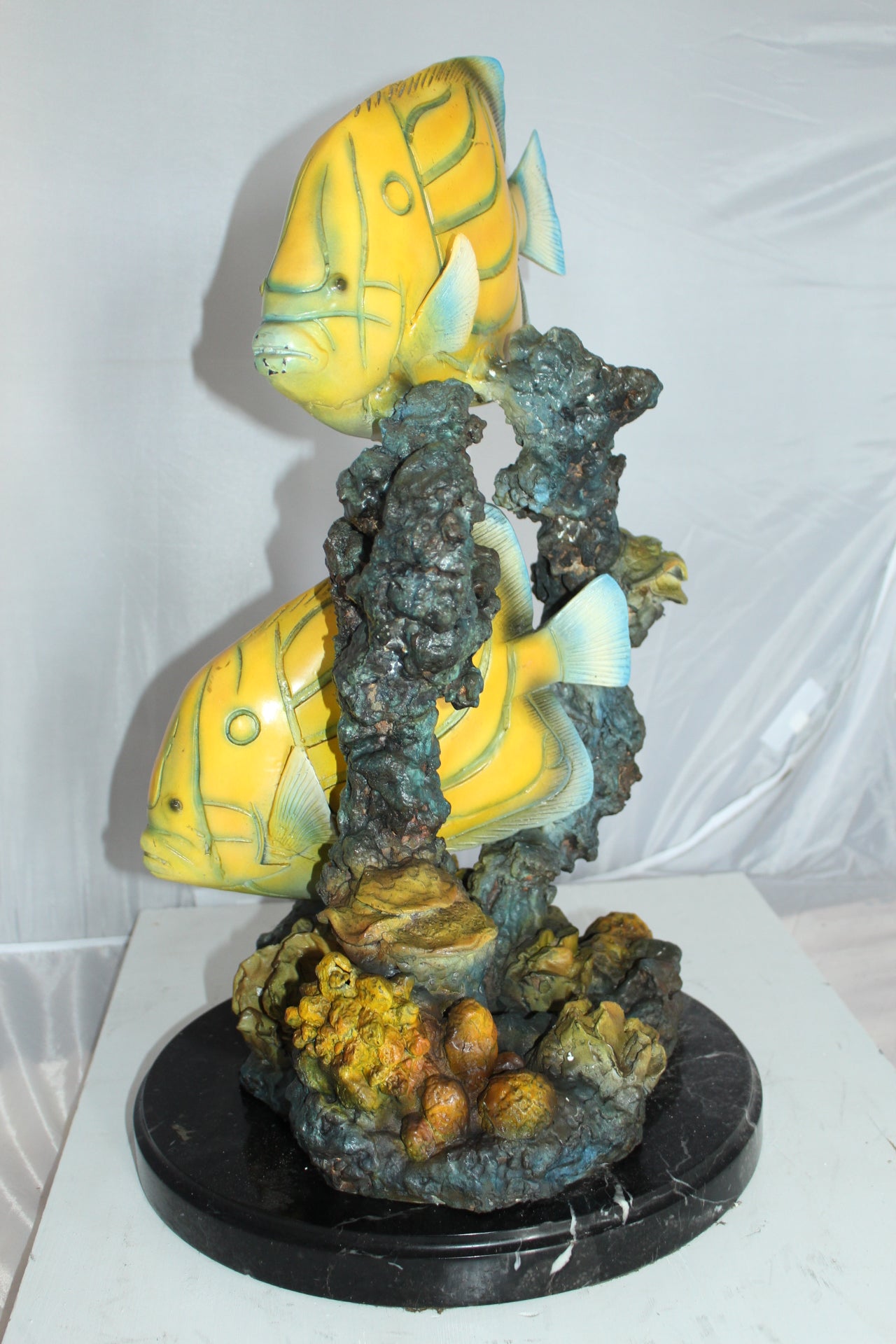 Two Butterfly fish swimming bronze statue - Size: 12"L x 12"W x 24"H.