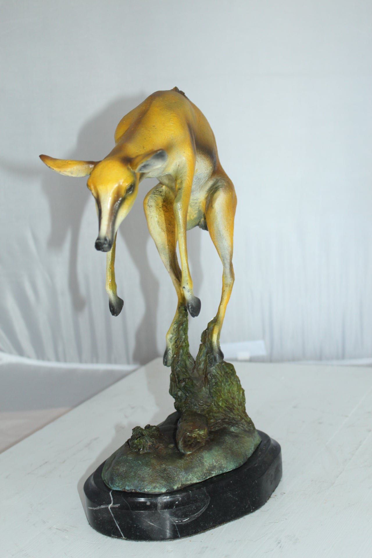 Jumping Impala bronze statue - Size: 9"L x 7"W x 16"H.