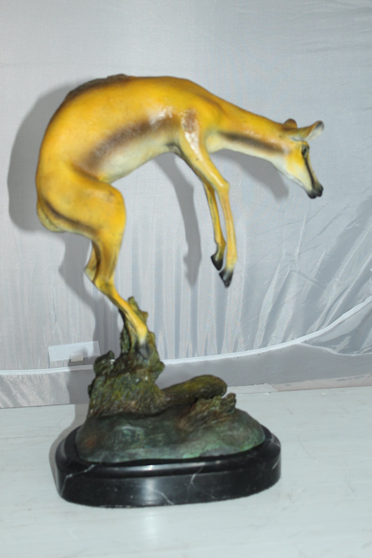 Jumping Impala bronze statue - Size: 9"L x 7"W x 16"H.