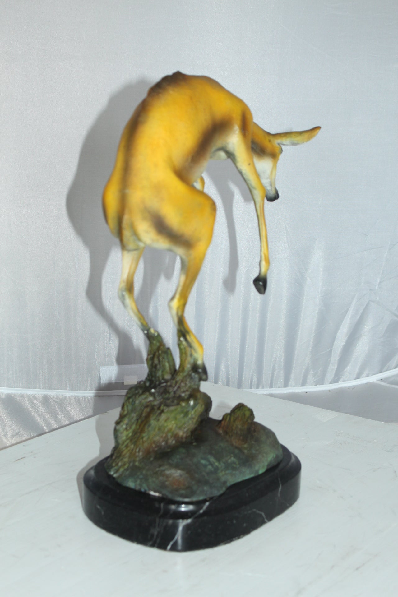 Jumping Impala bronze statue - Size: 9"L x 7"W x 16"H.