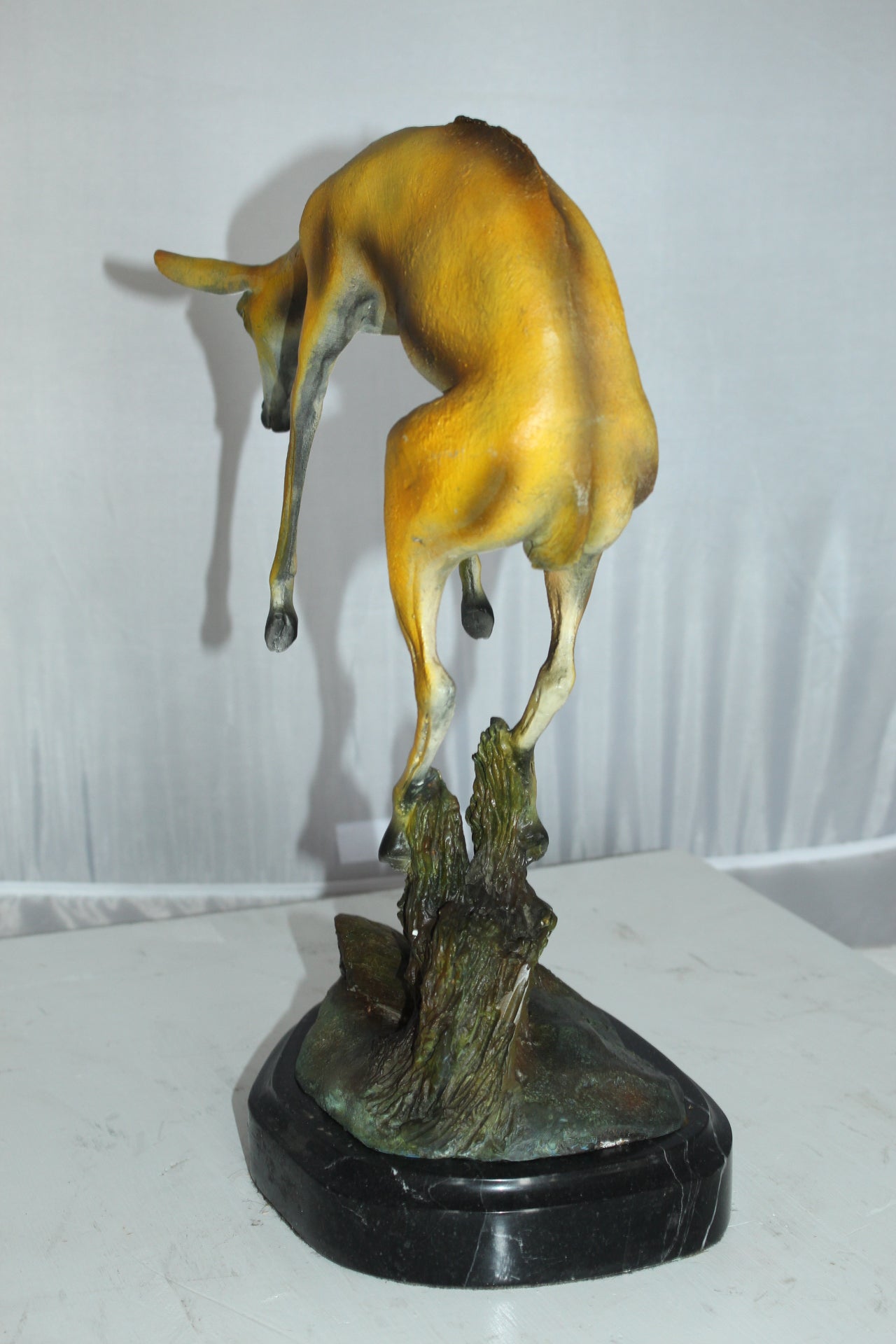 Jumping Impala bronze statue - Size: 9"L x 7"W x 16"H.