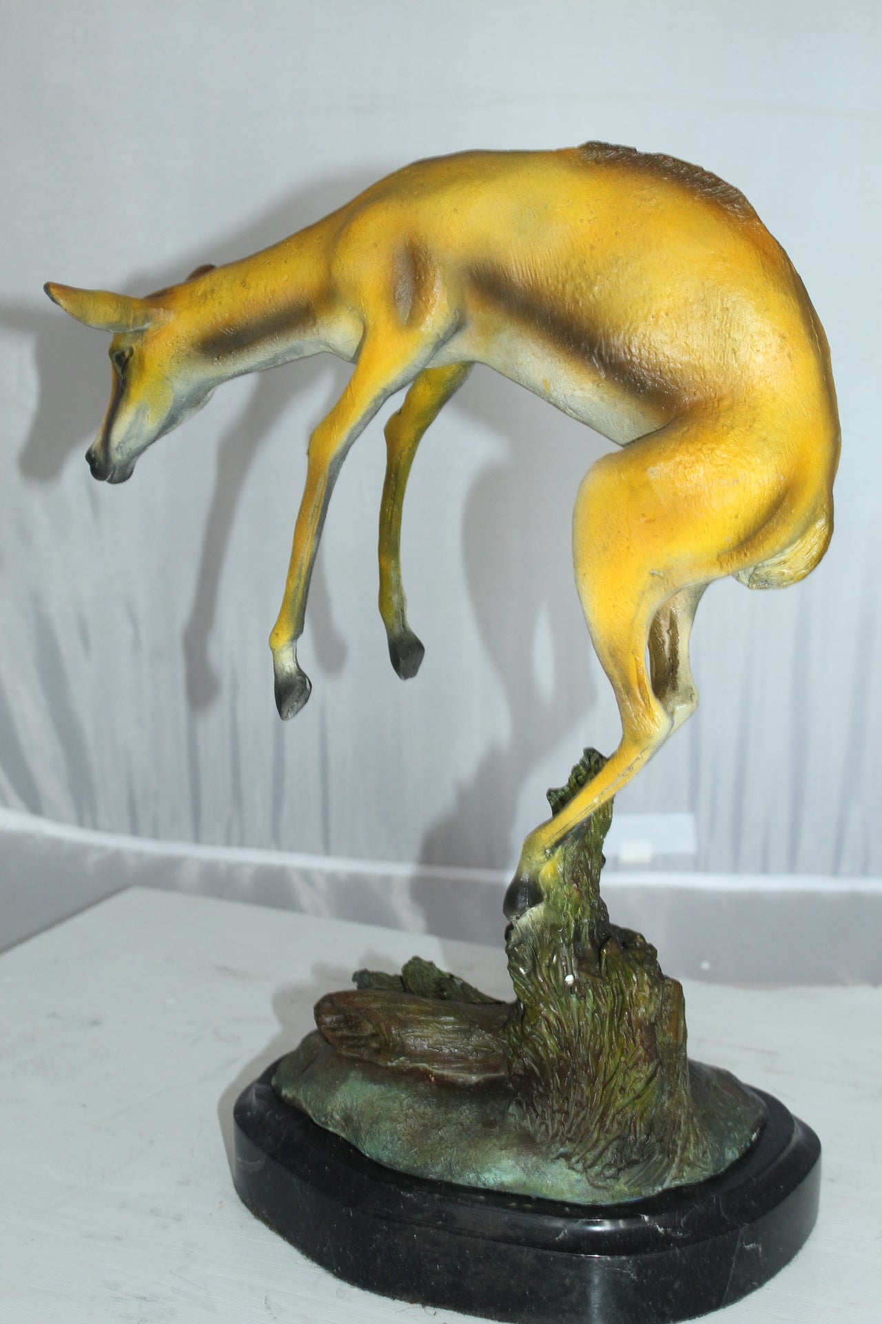 Jumping Impala bronze statue - Size: 9"L x 7"W x 16"H.