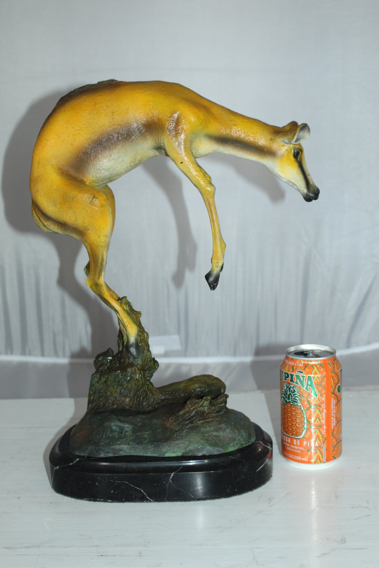 Jumping Impala bronze statue - Size: 9"L x 7"W x 16"H.